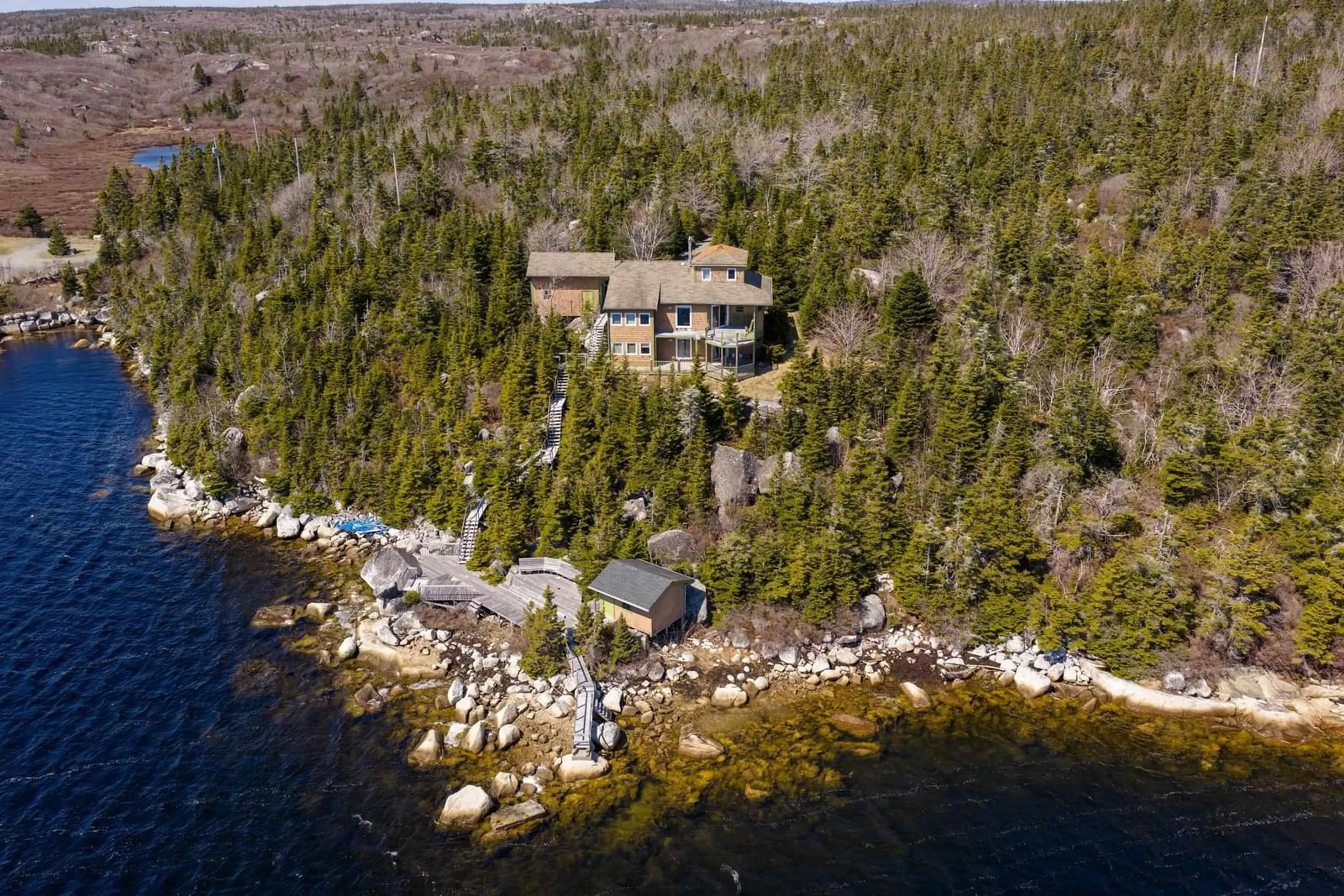 A pic from outside/outdoor area/front of a property/back of a property/a pic from drone, water/lake/river/ocean view for 10 Canyon Corner Road, Terence Bay Nova Scotia B3T 0H4