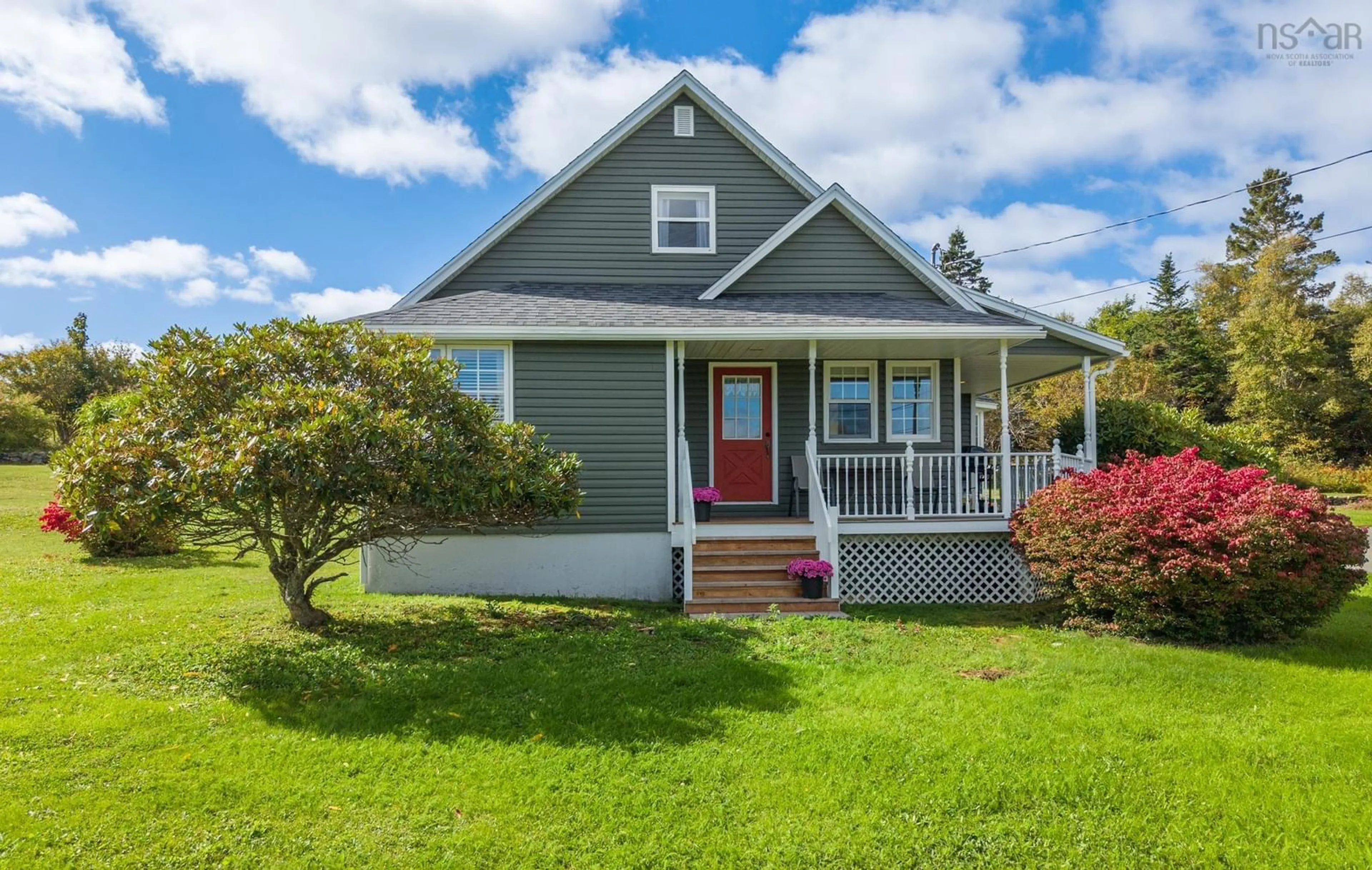 Home with vinyl exterior material, street for 6575 Highway 3, Eel Brook Nova Scotia B0W 2X0