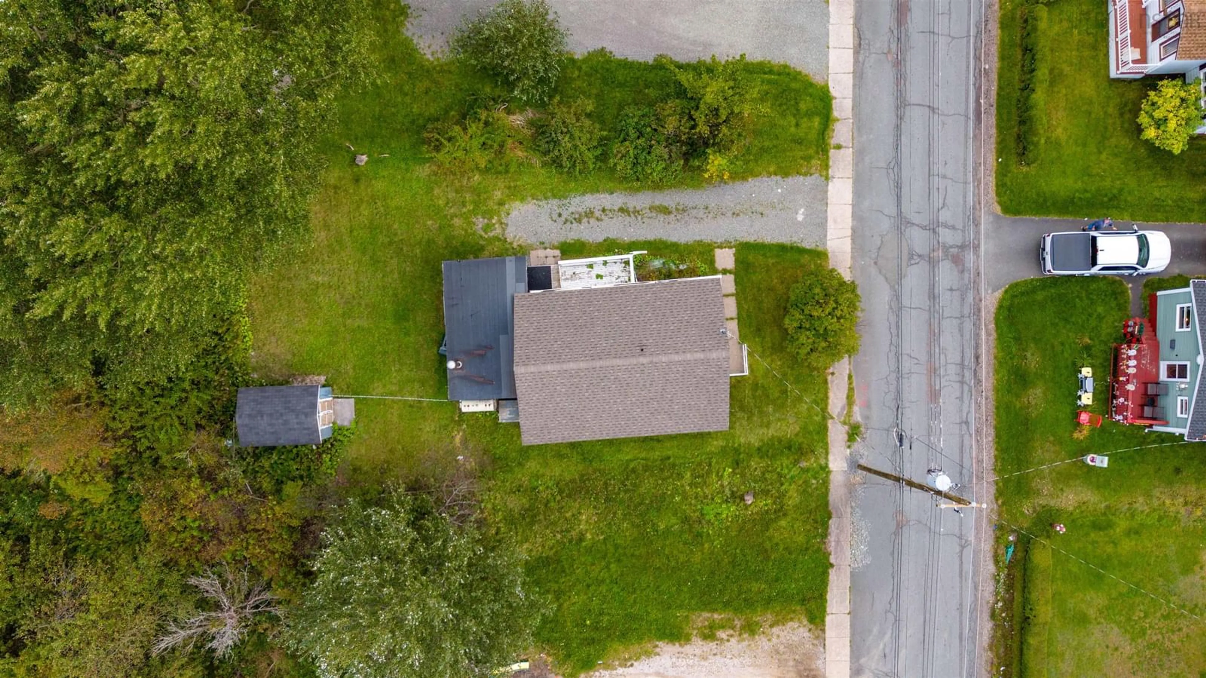 A pic from outside/outdoor area/front of a property/back of a property/a pic from drone, street for 123 Lake Rd, Glace Bay Nova Scotia B1A 2G8