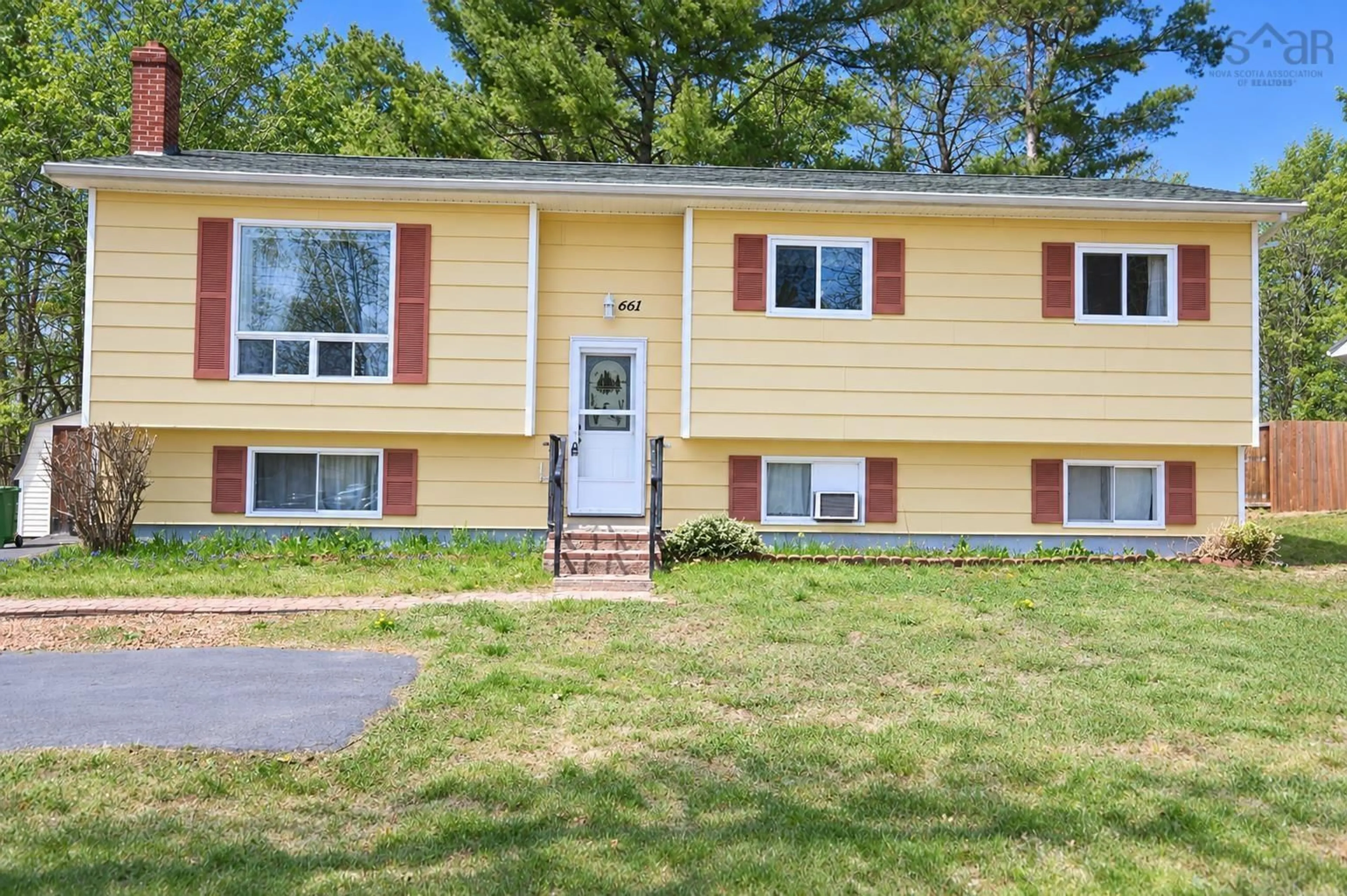 Home with vinyl exterior material, street for 661 Balser Dr, Kingston Nova Scotia B0P 1R0