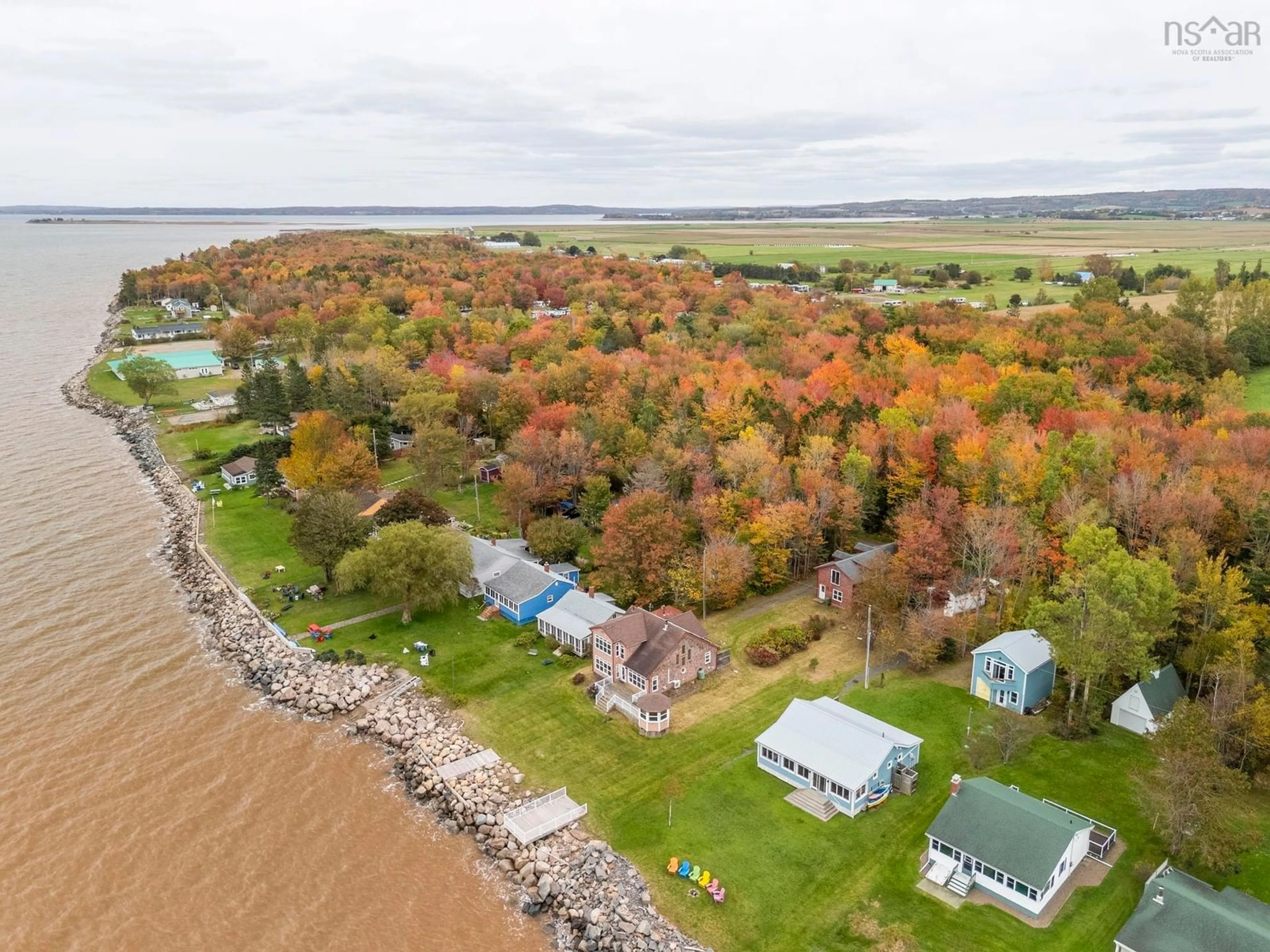 A pic from outside/outdoor area/front of a property/back of a property/a pic from drone, water/lake/river/ocean view for 157/161 Beach Row, North Grand Pre Nova Scotia B0P 1M0