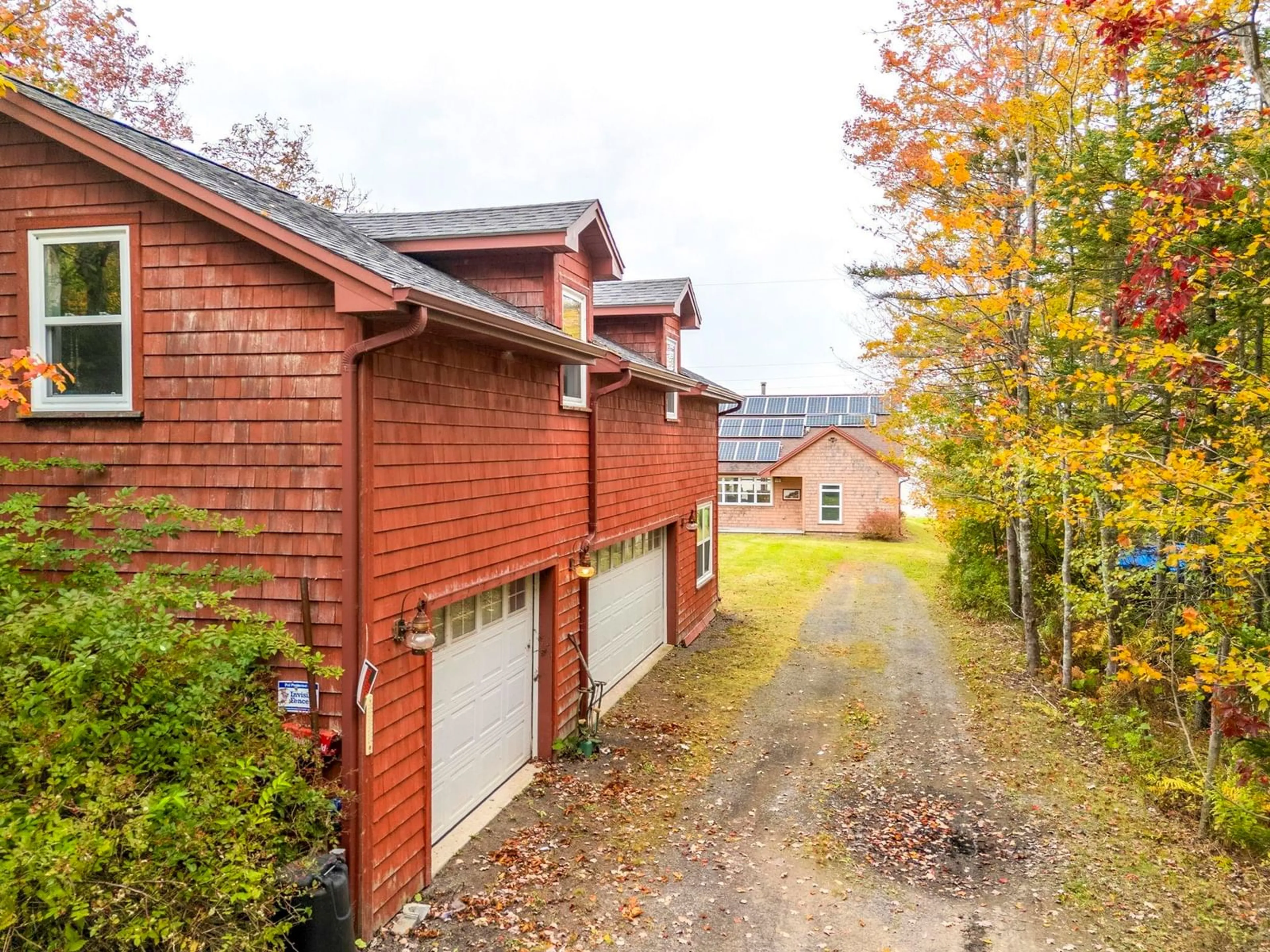 A pic from outside/outdoor area/front of a property/back of a property/a pic from drone, water/lake/river/ocean view for 157/161 Beach Row, North Grand Pre Nova Scotia B0P 1M0