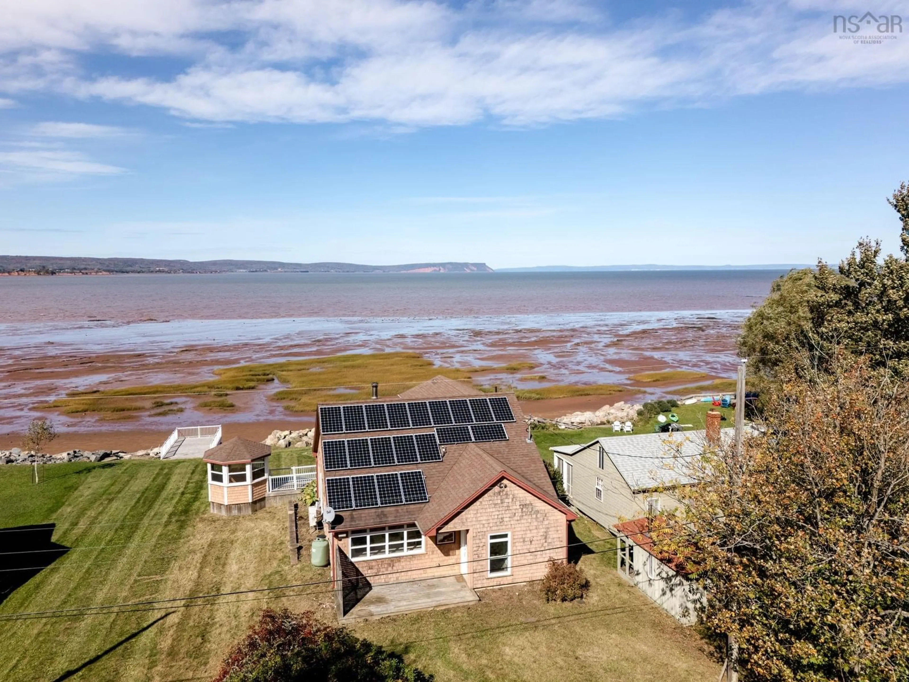 A pic from outside/outdoor area/front of a property/back of a property/a pic from drone, water/lake/river/ocean view for 157/161 Beach Row, North Grand Pre Nova Scotia B0P 1M0