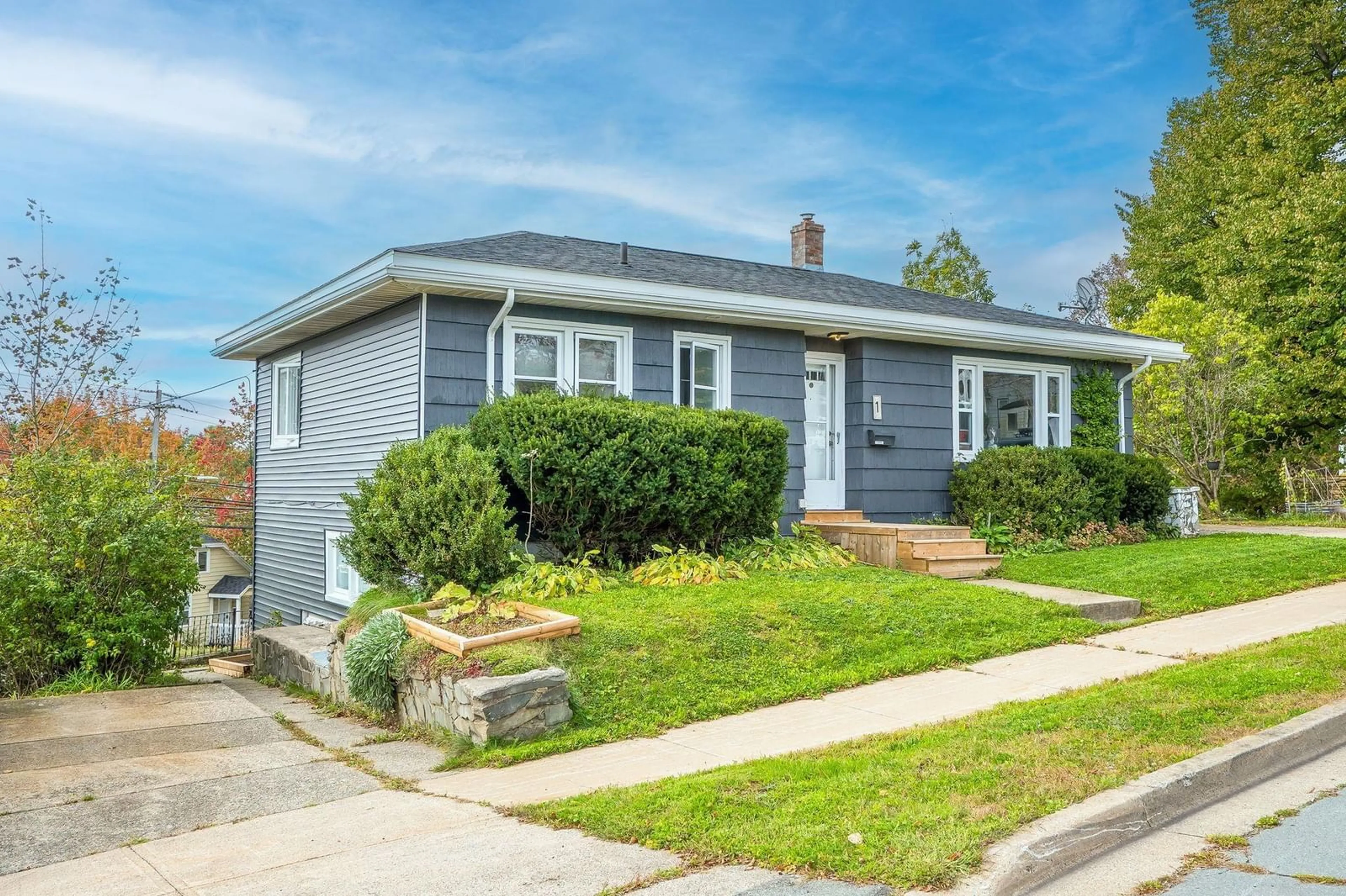 Home with vinyl exterior material, street for 1 Joffre St, Dartmouth Nova Scotia B2Y 3C7