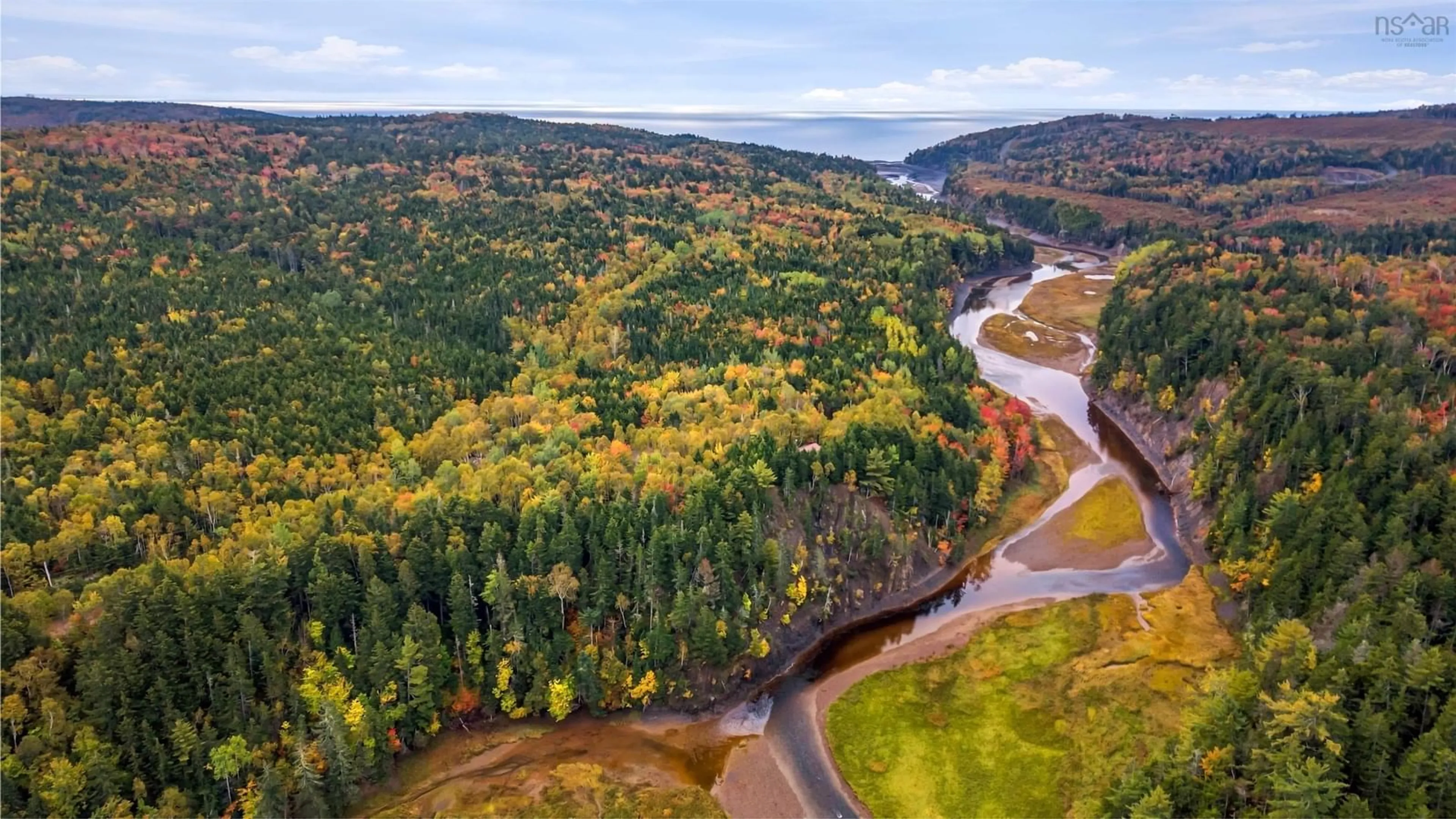 A pic from outside/outdoor area/front of a property/back of a property/a pic from drone, water/lake/river/ocean view for 12 Tidal River Ridge Rd, Moose River Nova Scotia B0M 1N0