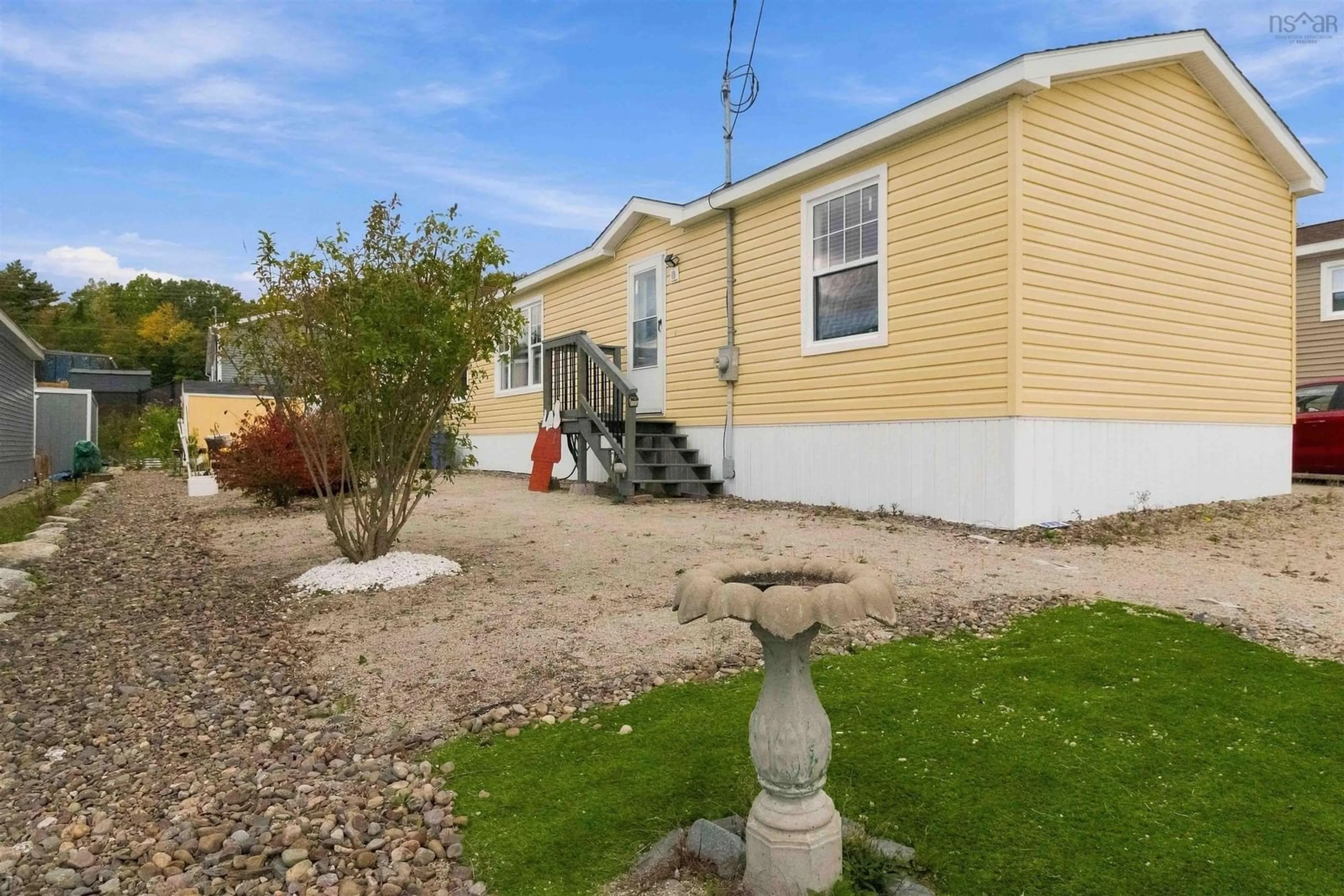 Home with vinyl exterior material, street for 17 Periwinkle Run, Simms Settlement Nova Scotia B0J 1T0