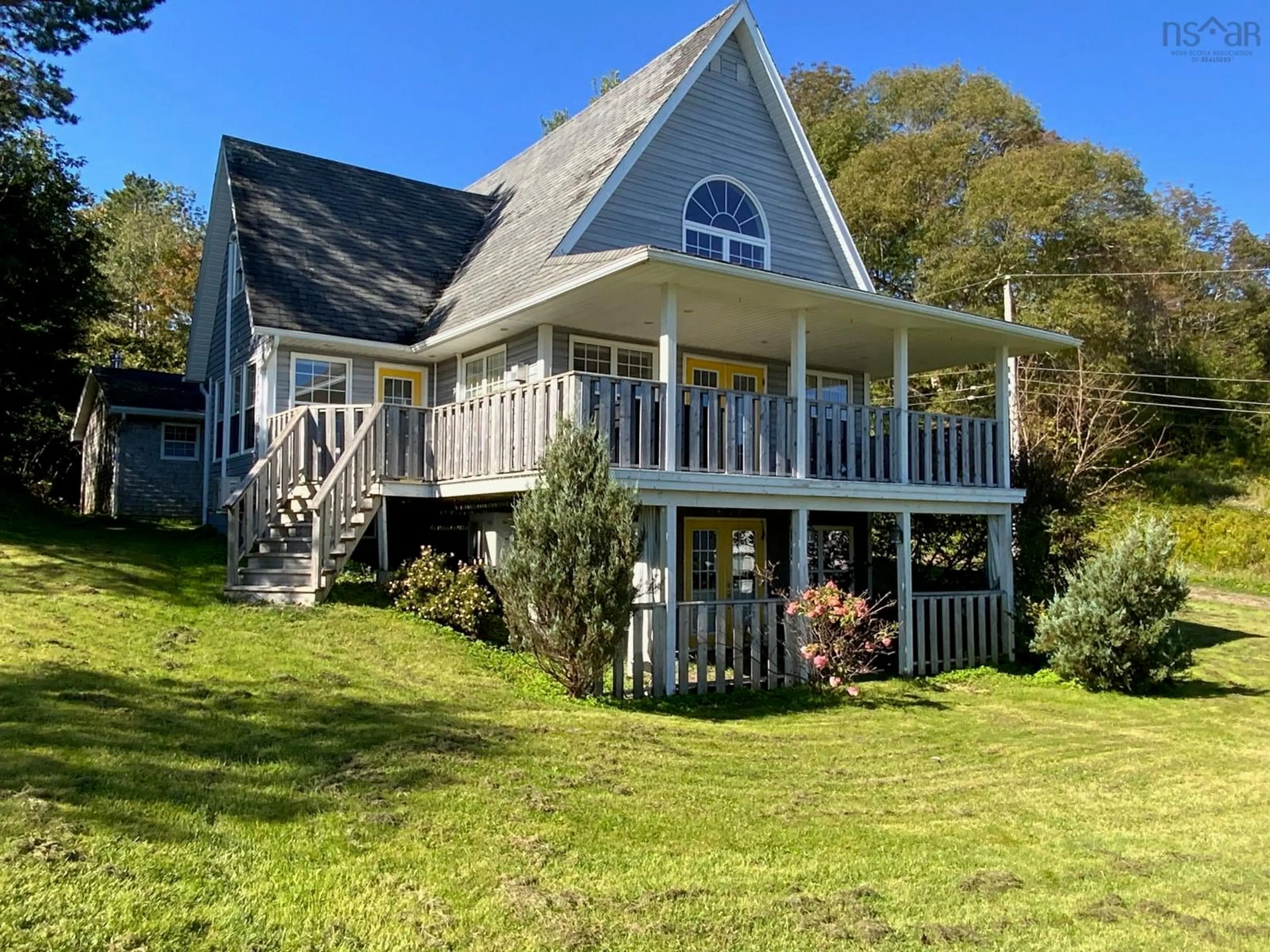 A pic from outside/outdoor area/front of a property/back of a property/a pic from drone, water/lake/river/ocean view for 11 North Street Lane, Guysborough Nova Scotia B0H 1N0