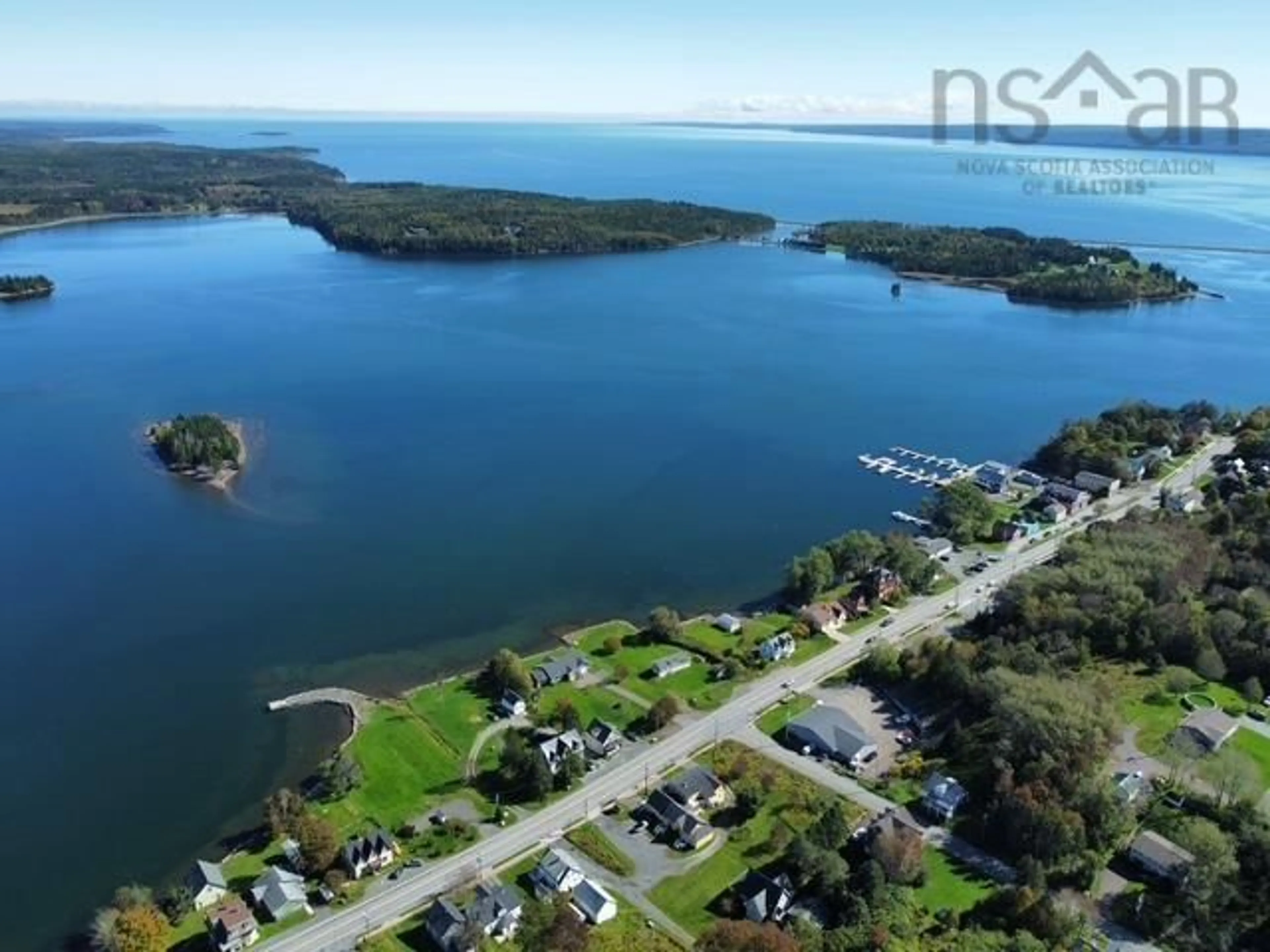 A pic from outside/outdoor area/front of a property/back of a property/a pic from drone, water/lake/river/ocean view for 11 North Street Lane, Guysborough Nova Scotia B0H 1N0