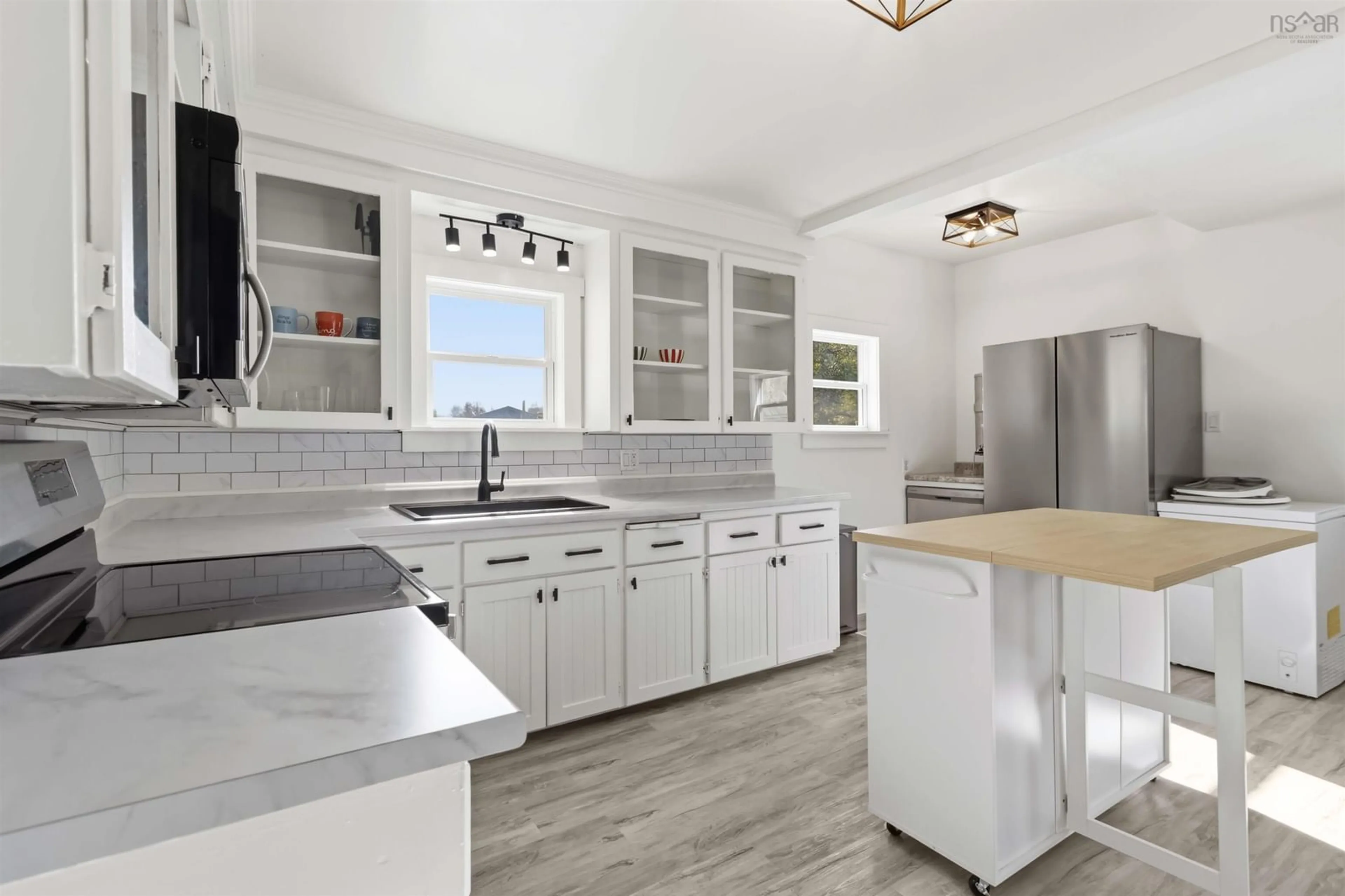 Open concept kitchen, ceramic/tile floor for 6783 10 Hwy, New Germany Nova Scotia B0R 1E0