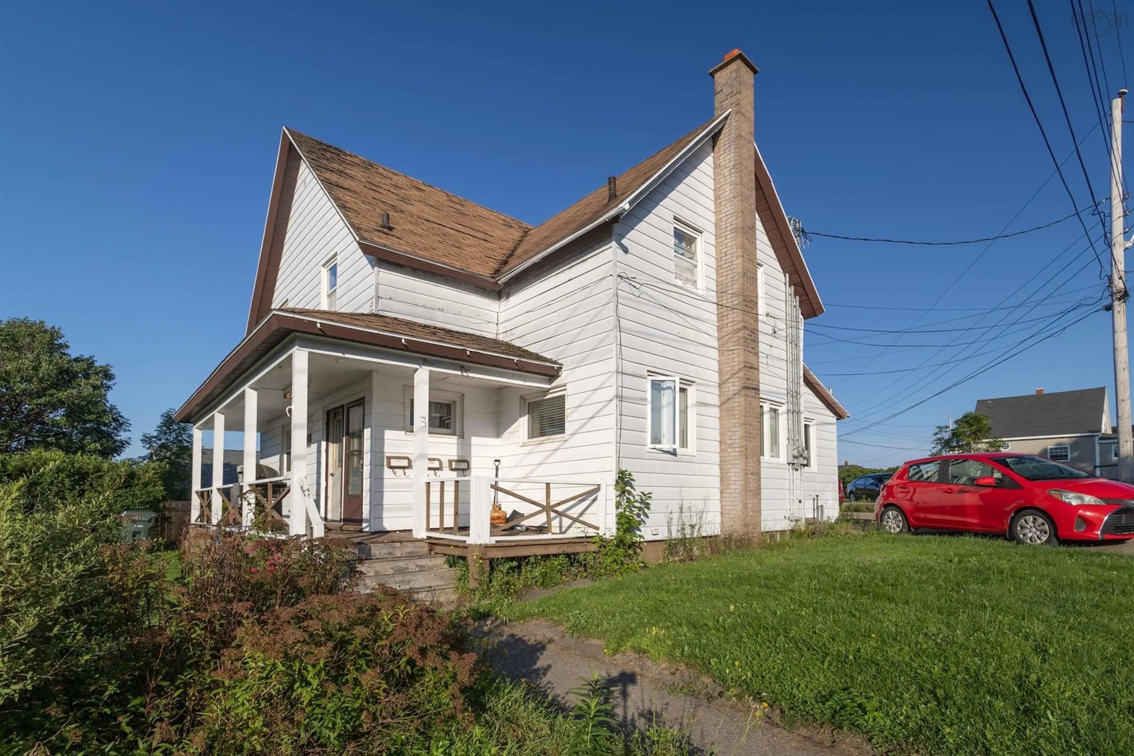 A pic from outside/outdoor area/front of a property/back of a property/a pic from drone, building for 3 Collins St, Glace Bay Nova Scotia B1C 1A5