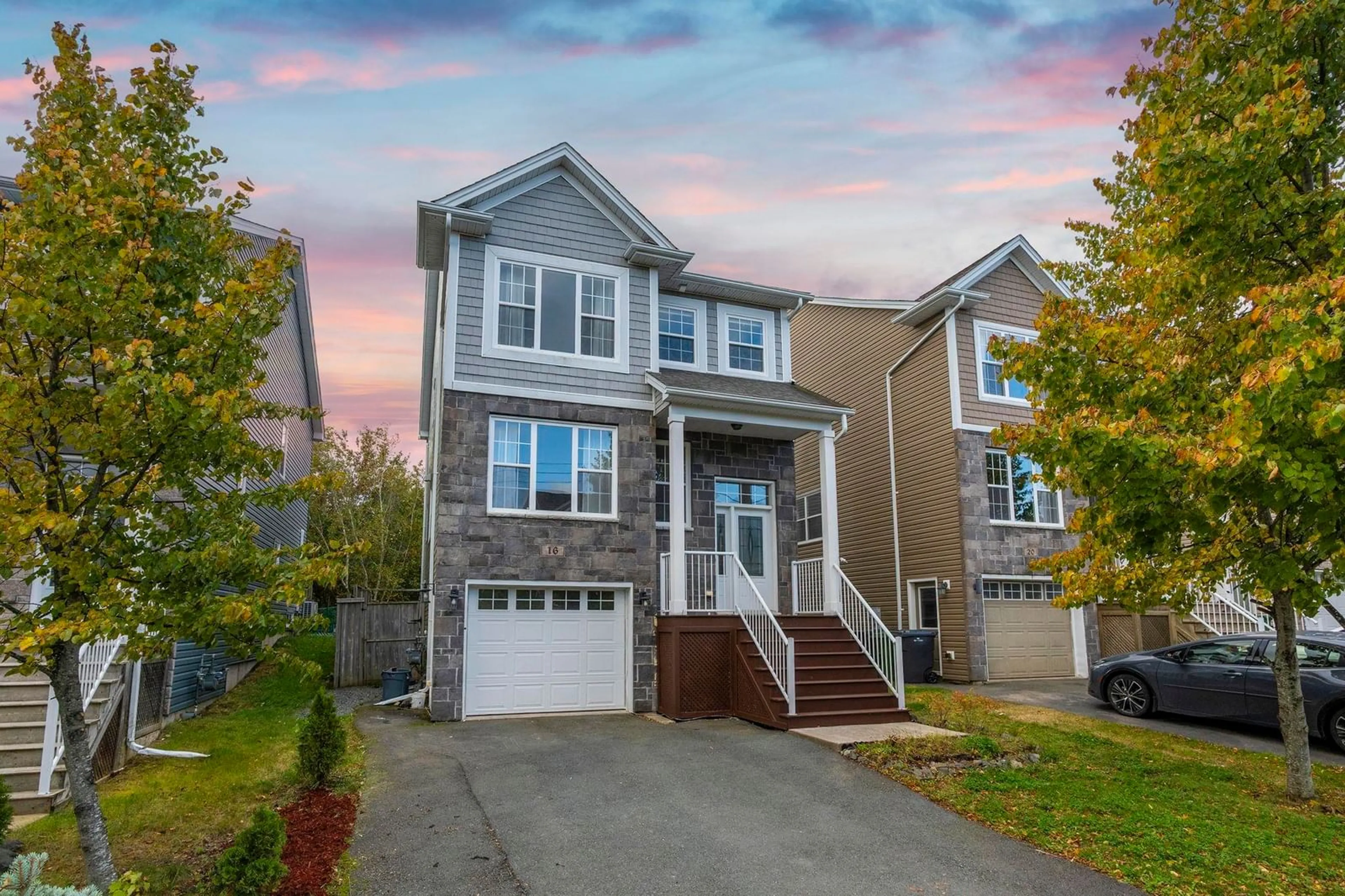Home with vinyl exterior material, street for 16 Lowther Lane, Bedford Nova Scotia B4B 0L6
