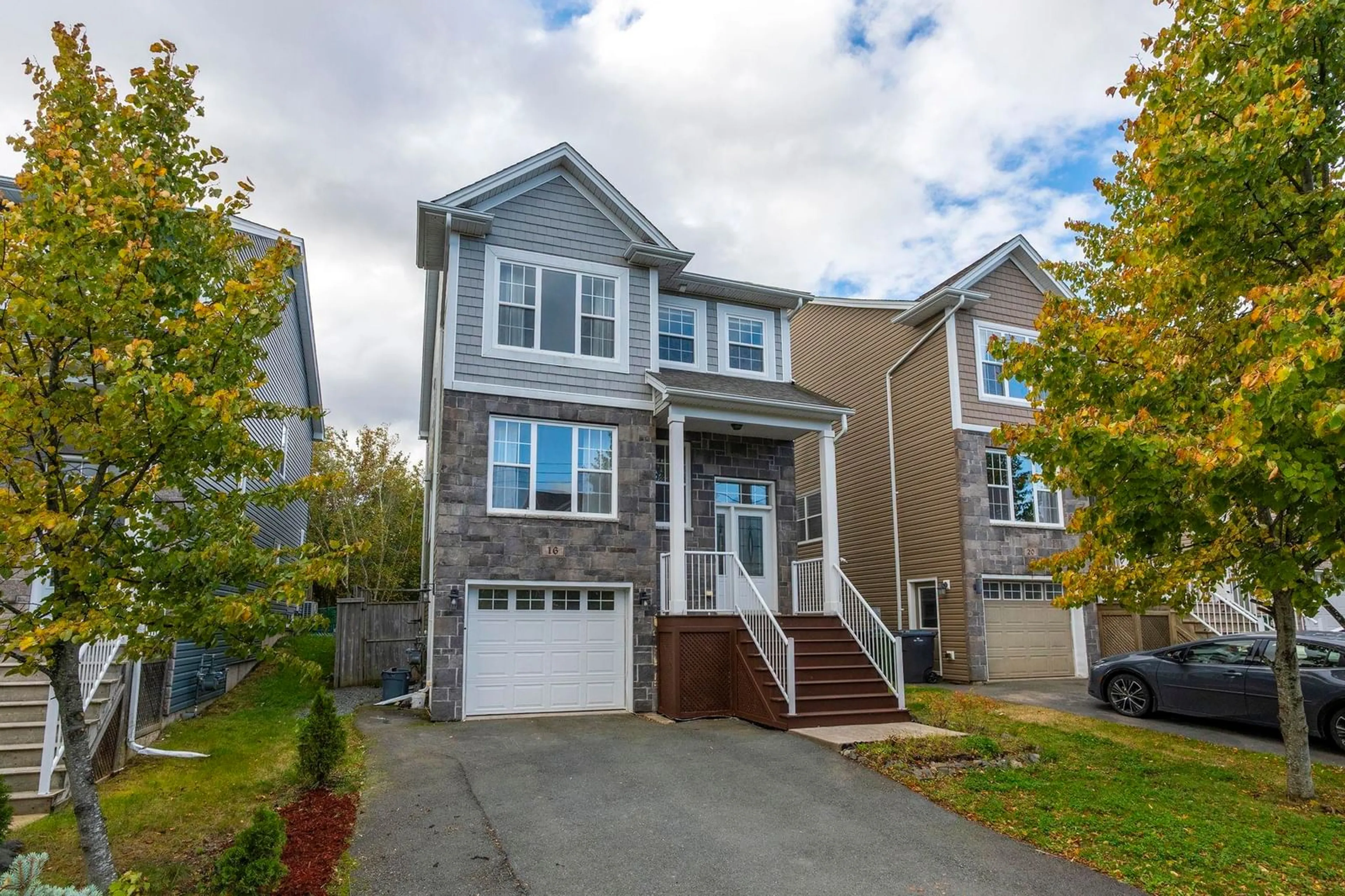 Home with vinyl exterior material, street for 16 Lowther Lane, Bedford Nova Scotia B4B 0L6