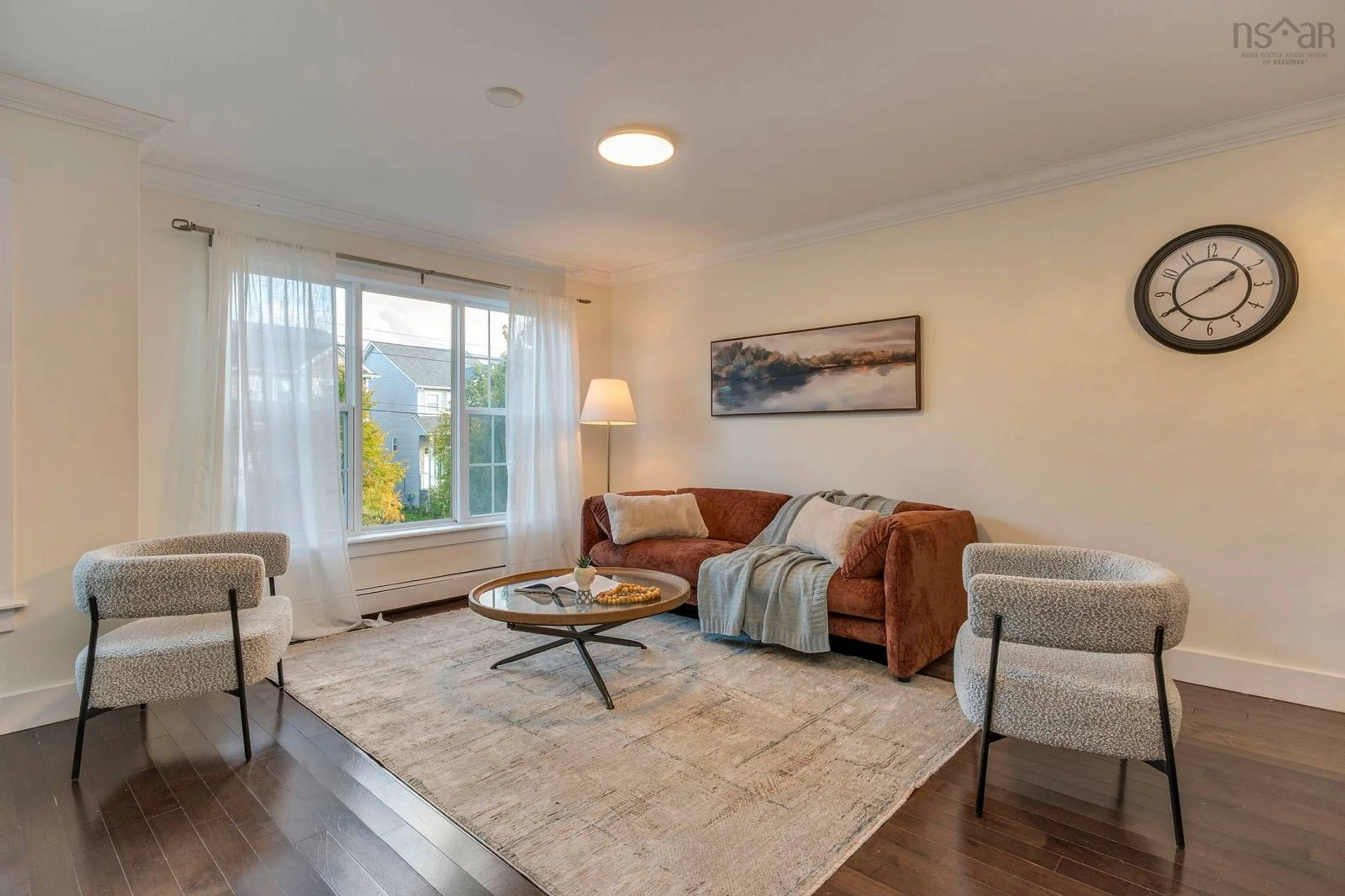 Living room with furniture, wood/laminate floor for 16 Lowther Lane, Bedford Nova Scotia B4B 0L6