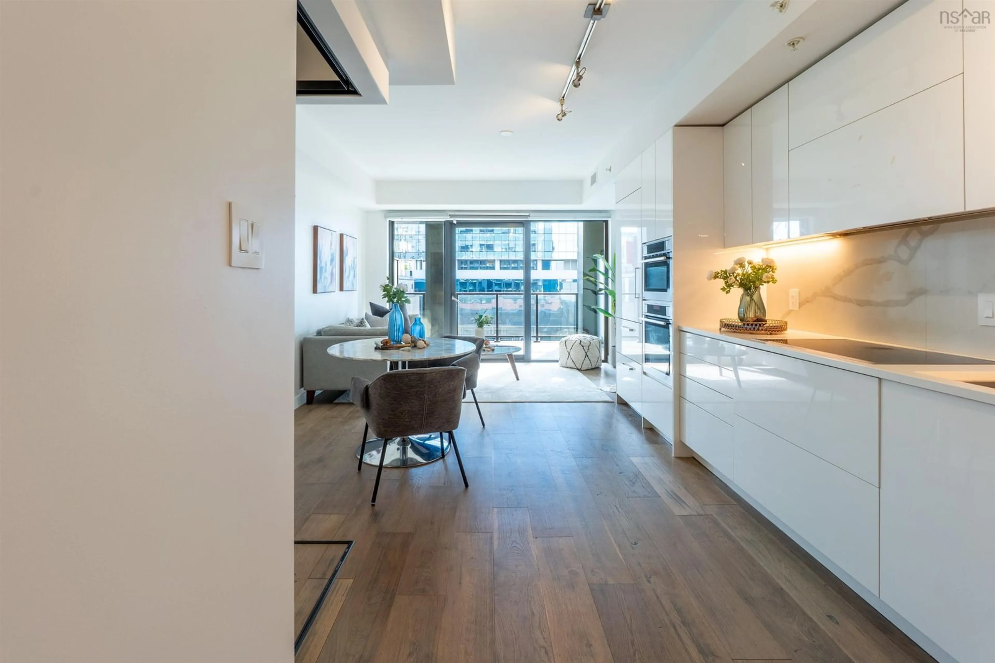 Open concept kitchen, wood/laminate floor for 1650 Granville Street #1001, Halifax Nova Scotia B3J 0E1
