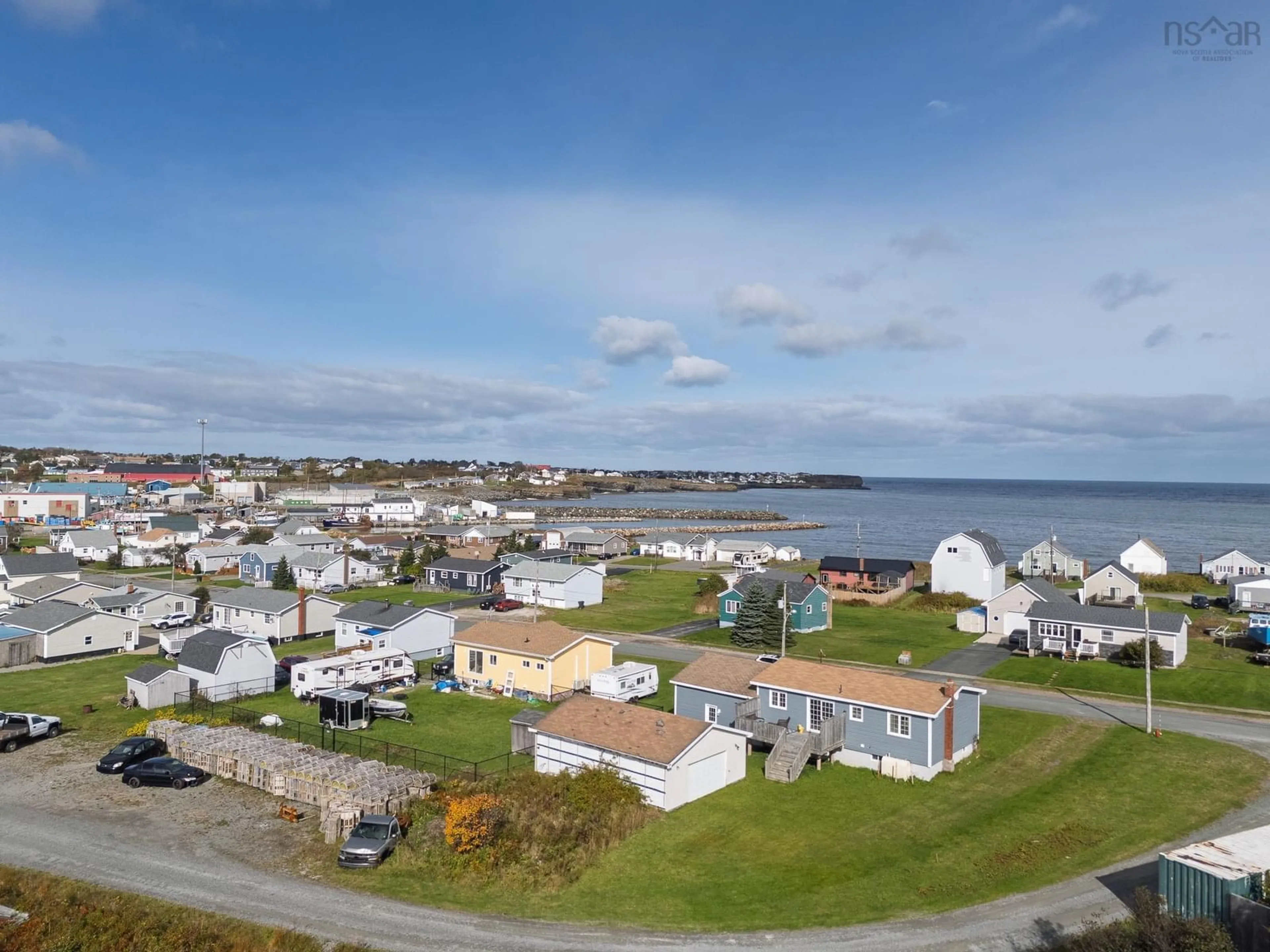 A pic from outside/outdoor area/front of a property/back of a property/a pic from drone, water/lake/river/ocean view for 22 Atlantic Street, Glace Bay Nova Scotia B1A 1S5