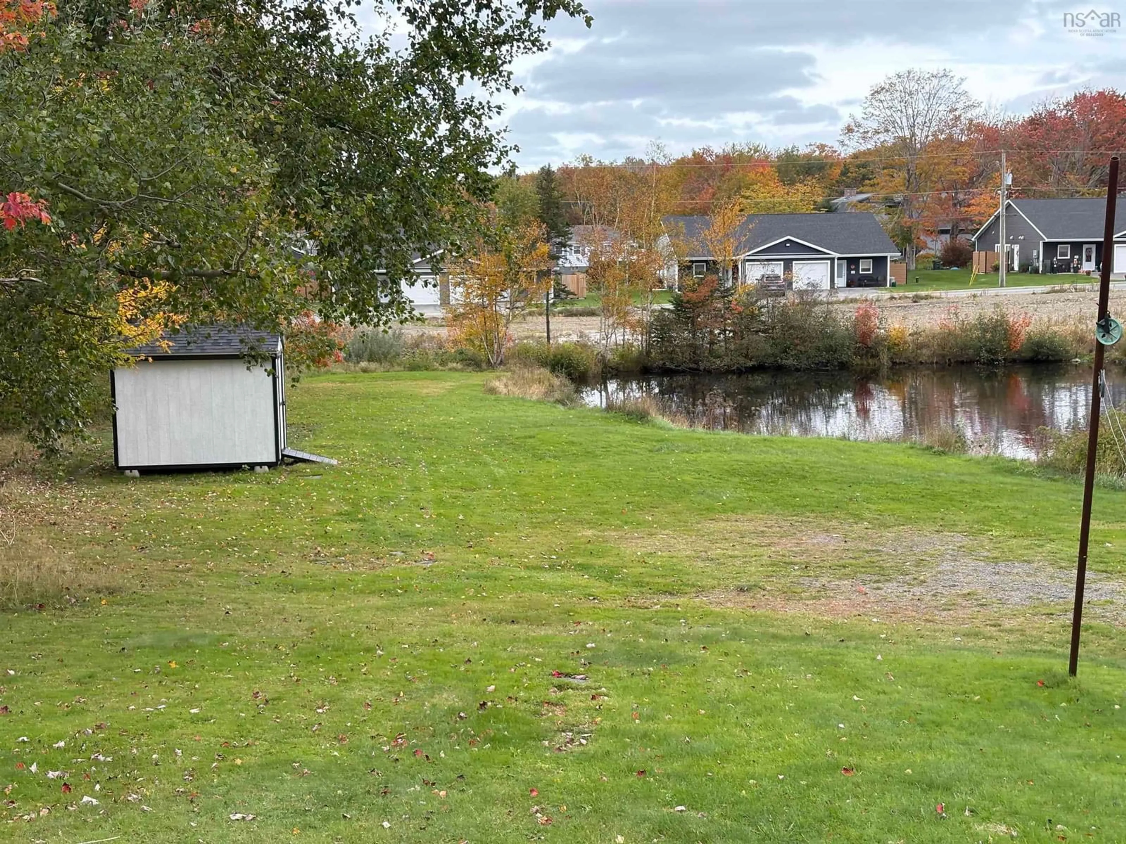 A pic from outside/outdoor area/front of a property/back of a property/a pic from drone, water/lake/river/ocean view for 111 Greenhill Dr, Sydney River Nova Scotia B1S 1K4