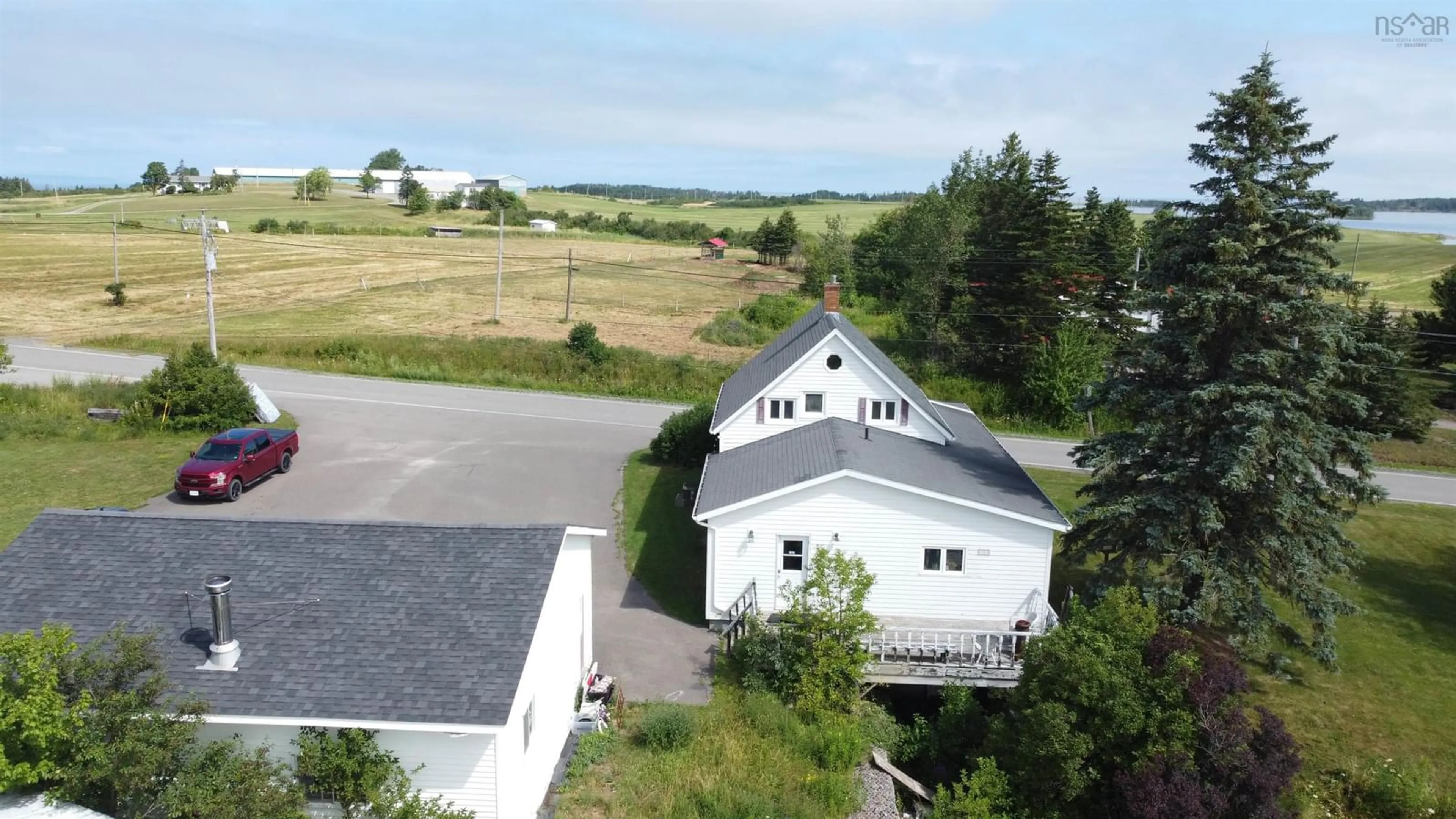 A pic from outside/outdoor area/front of a property/back of a property/a pic from drone, building for 9390 Highway 4, Tracadie Nova Scotia B0H 1W0
