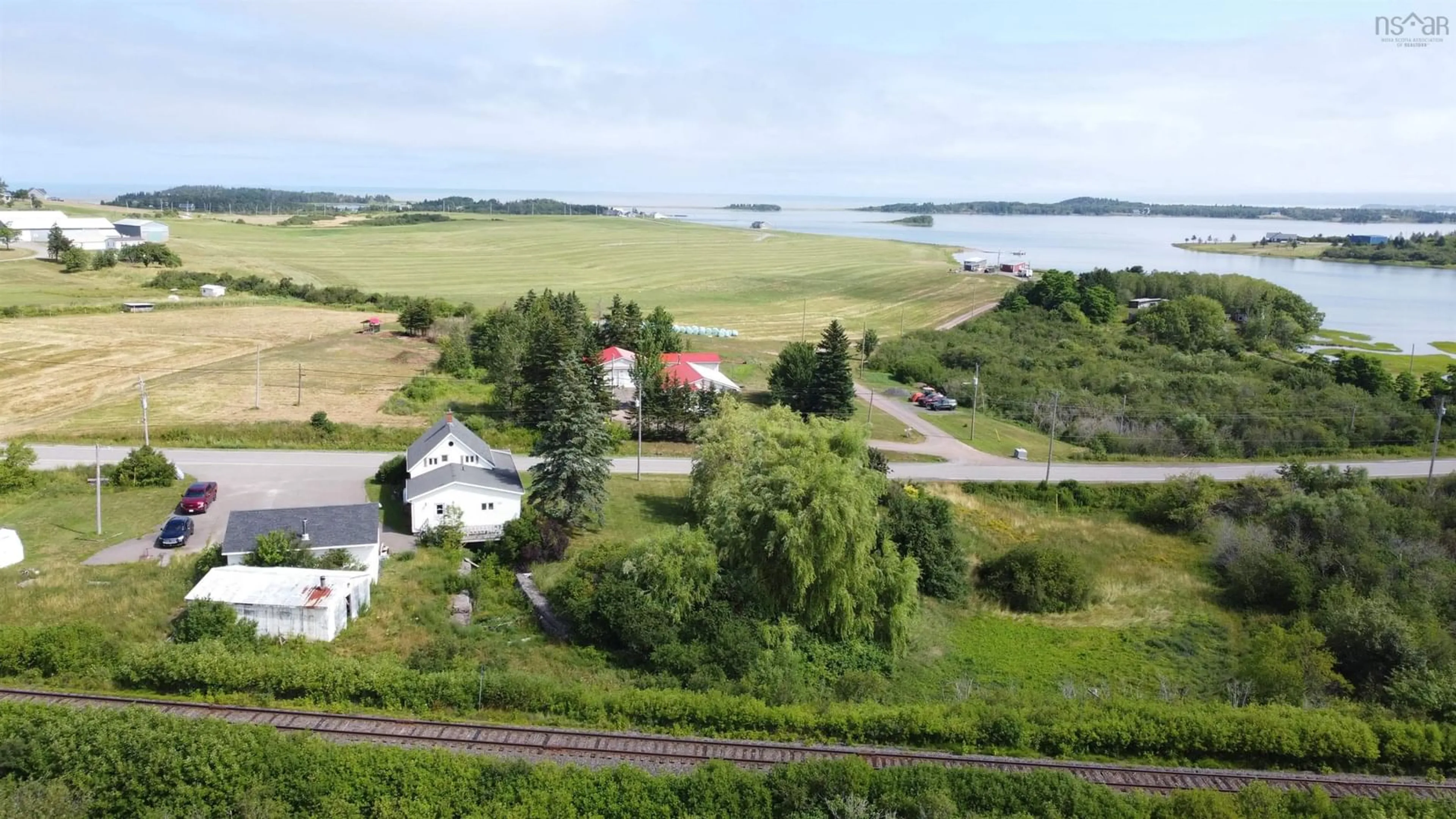 A pic from outside/outdoor area/front of a property/back of a property/a pic from drone, water/lake/river/ocean view for 9390 Highway 4, Tracadie Nova Scotia B0H 1W0