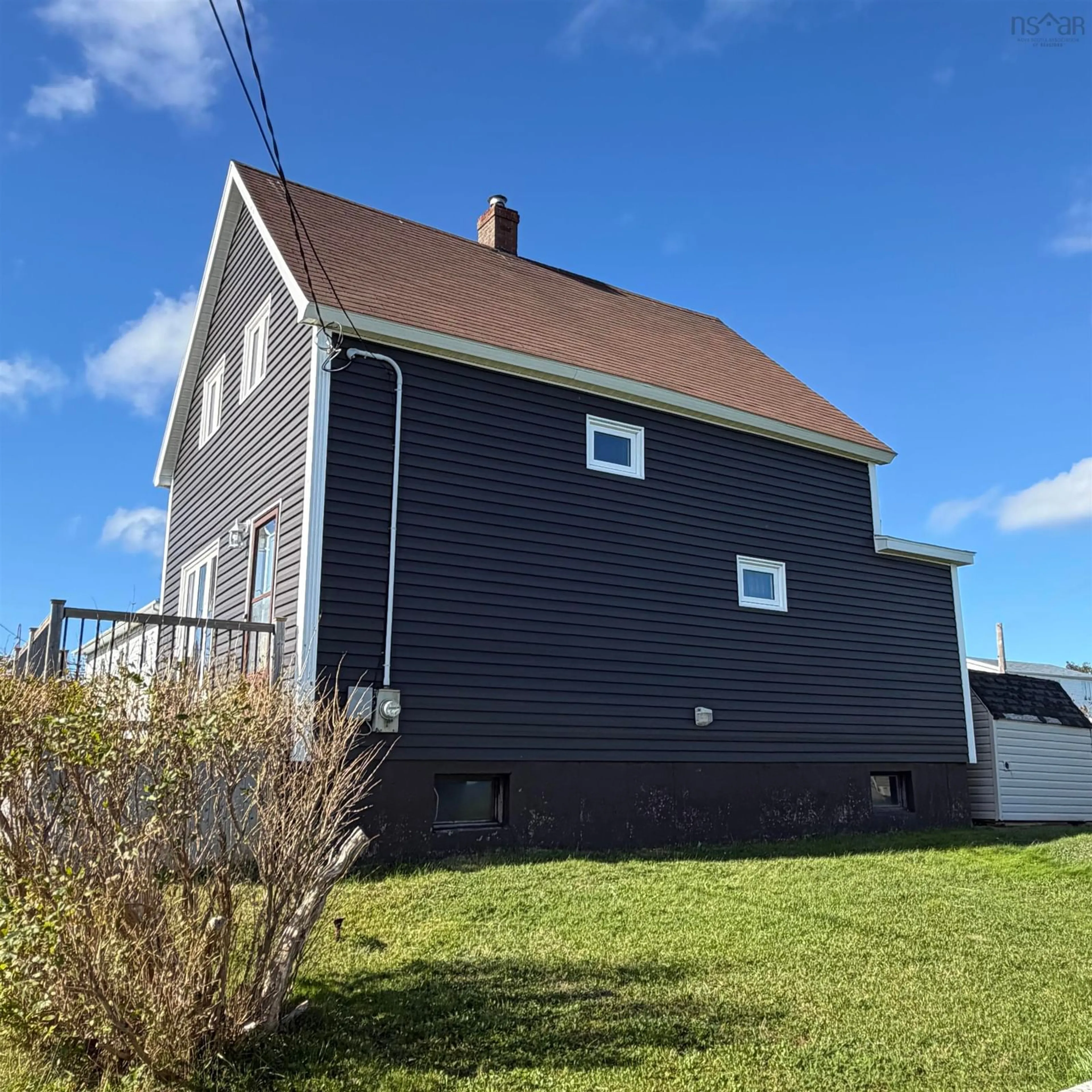 Home with vinyl exterior material, building for 65 Cliff St, Port Morien Nova Scotia B1B 1B4