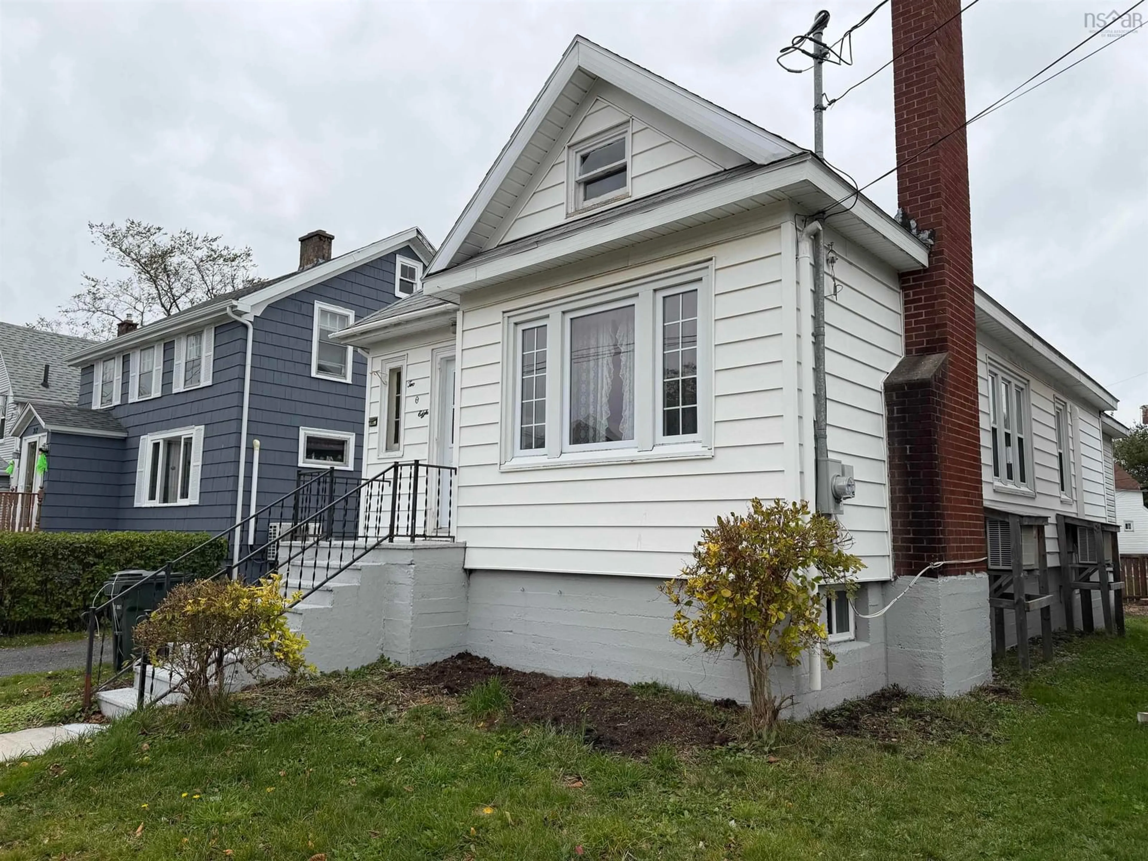 Home with vinyl exterior material, street for 208 Dillon St, Sydney Nova Scotia B1P 5C2