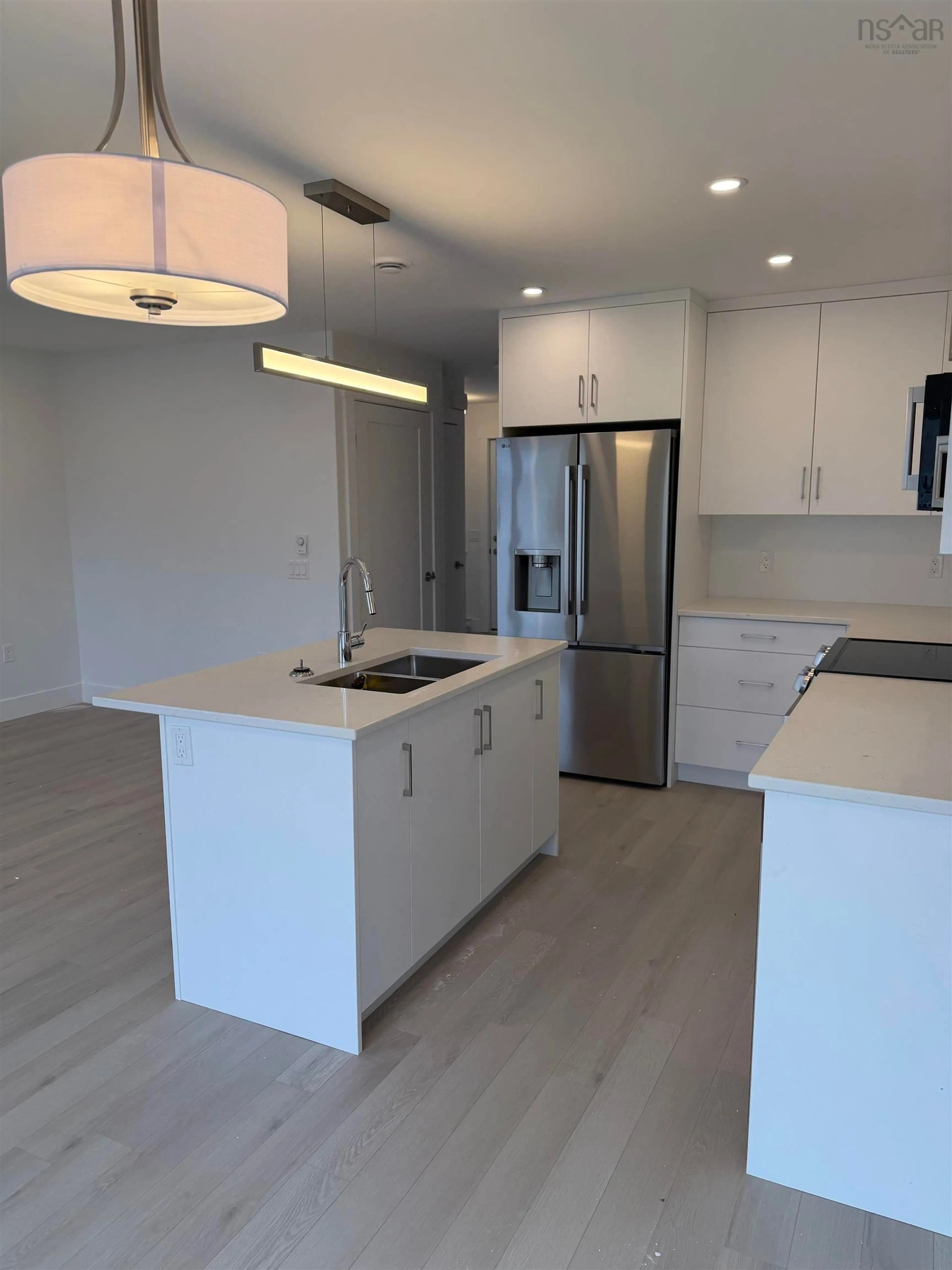 Open concept kitchen, wood/laminate floor for 107 Alabaster Way, Halifax Nova Scotia B3P 0C5
