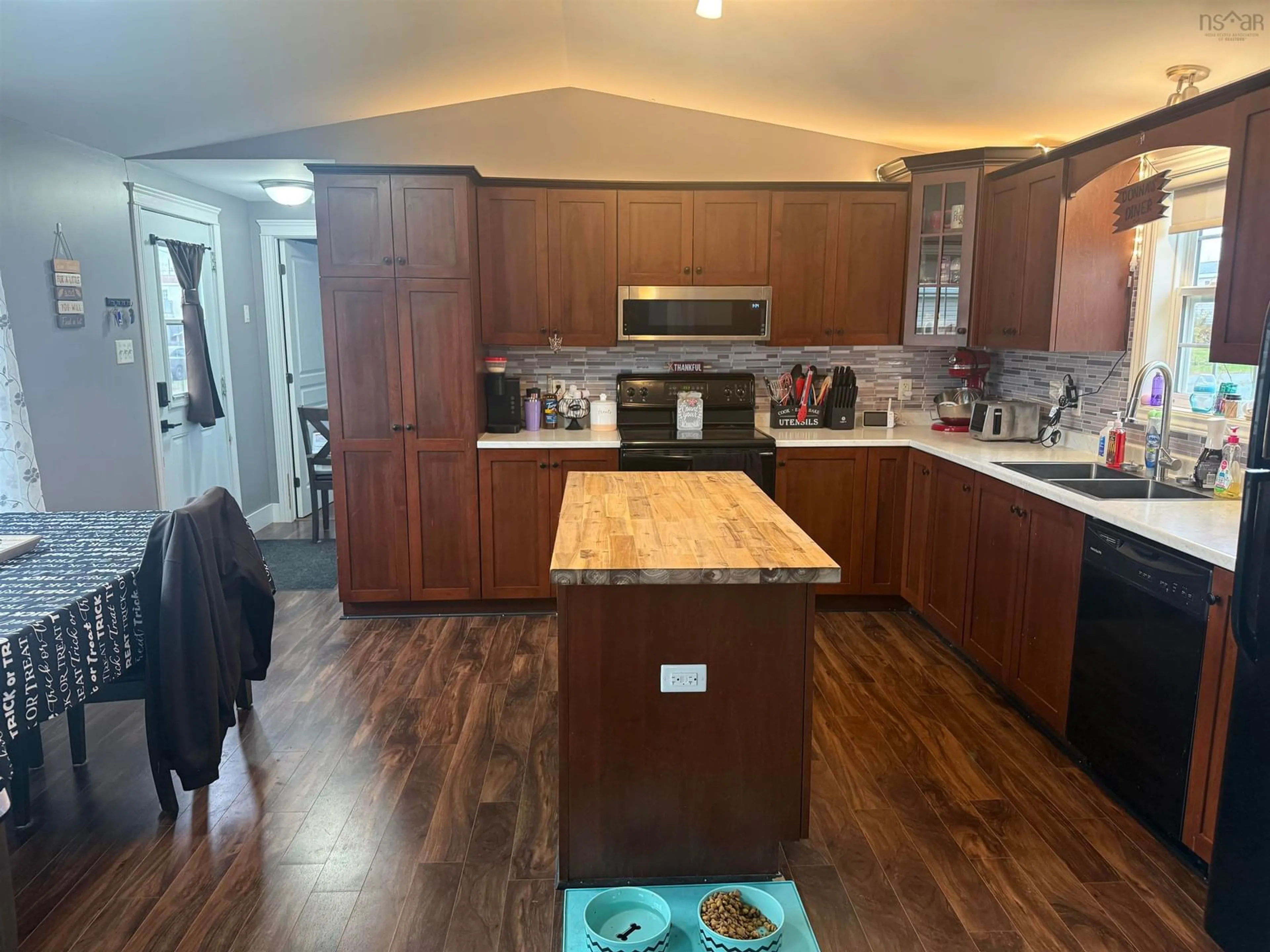 Open concept kitchen, wood/laminate floor for 50 Silver Birch Dr, Lower South River Nova Scotia B2G 0J5