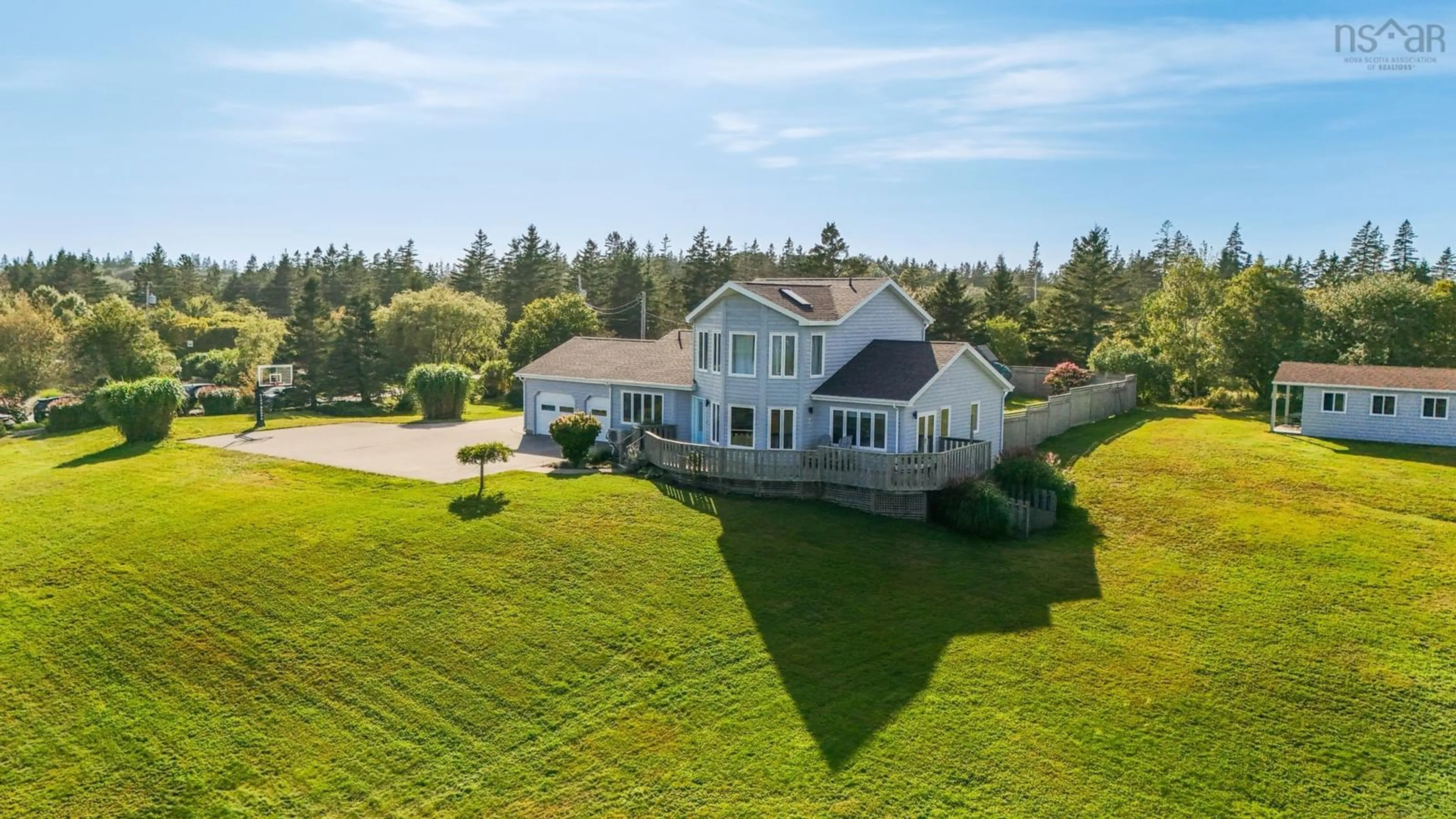 A pic from outside/outdoor area/front of a property/back of a property/a pic from drone, water/lake/river/ocean view for 401 Lakeside Rd, Dayton Nova Scotia B5A 5K3