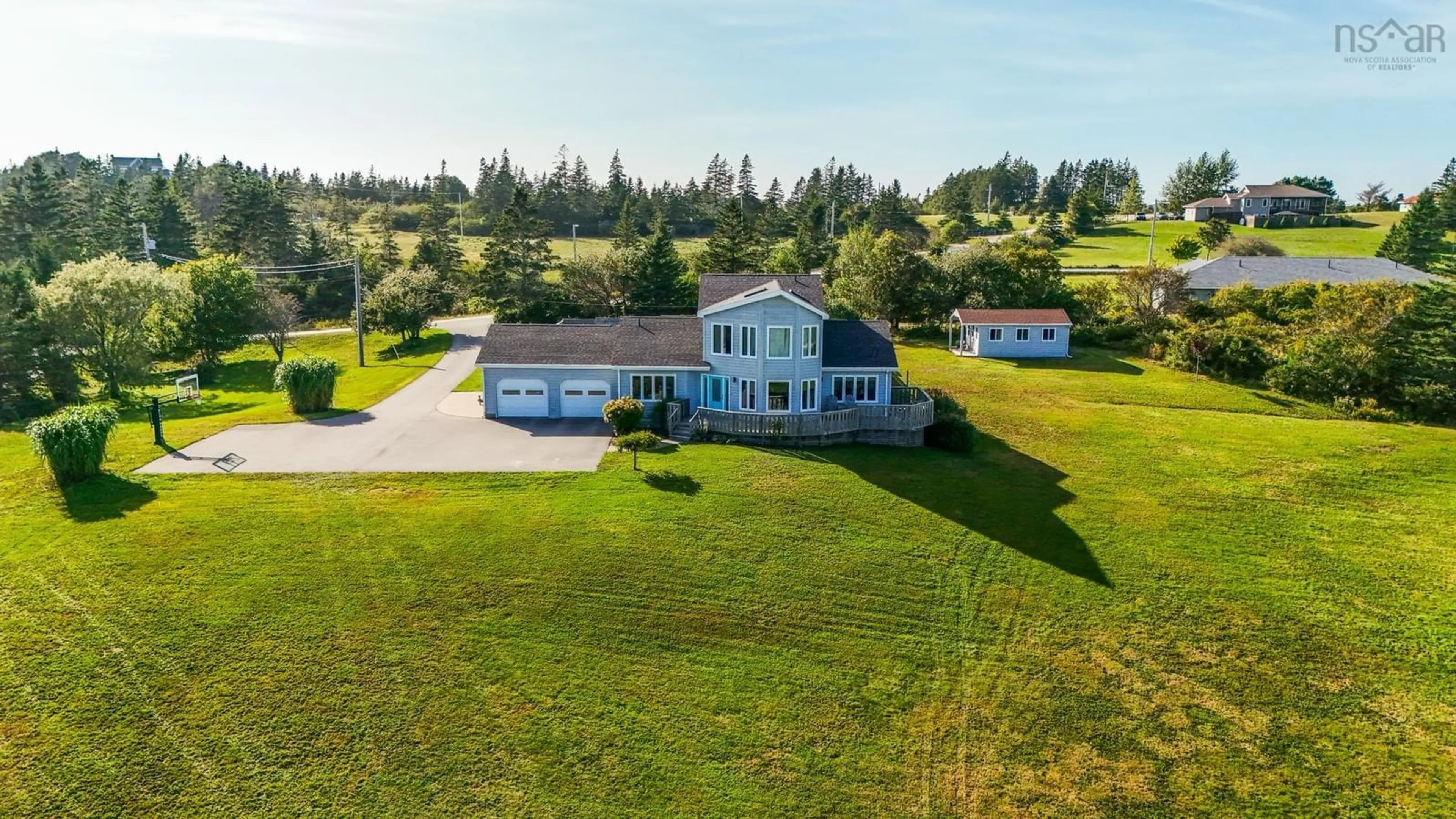 A pic from outside/outdoor area/front of a property/back of a property/a pic from drone, water/lake/river/ocean view for 401 Lakeside Rd, Dayton Nova Scotia B5A 5K3