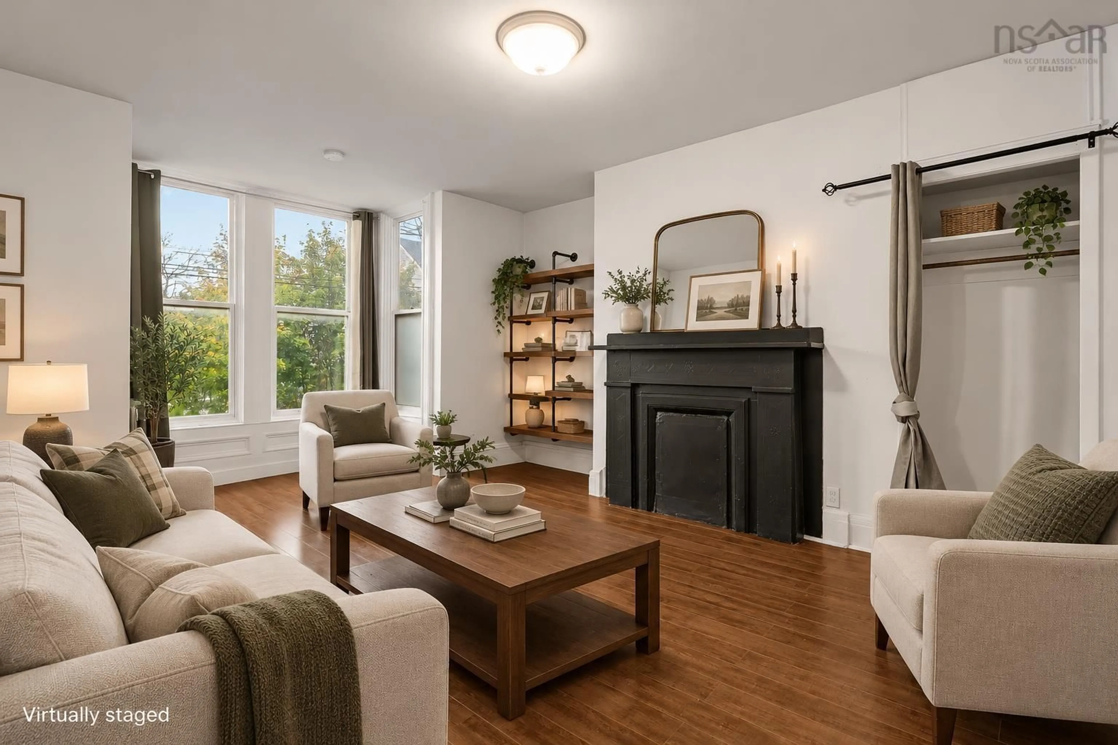 Living room with furniture, wood/laminate floor for 2556 Gottingen St, Halifax Nova Scotia B3K 3C4