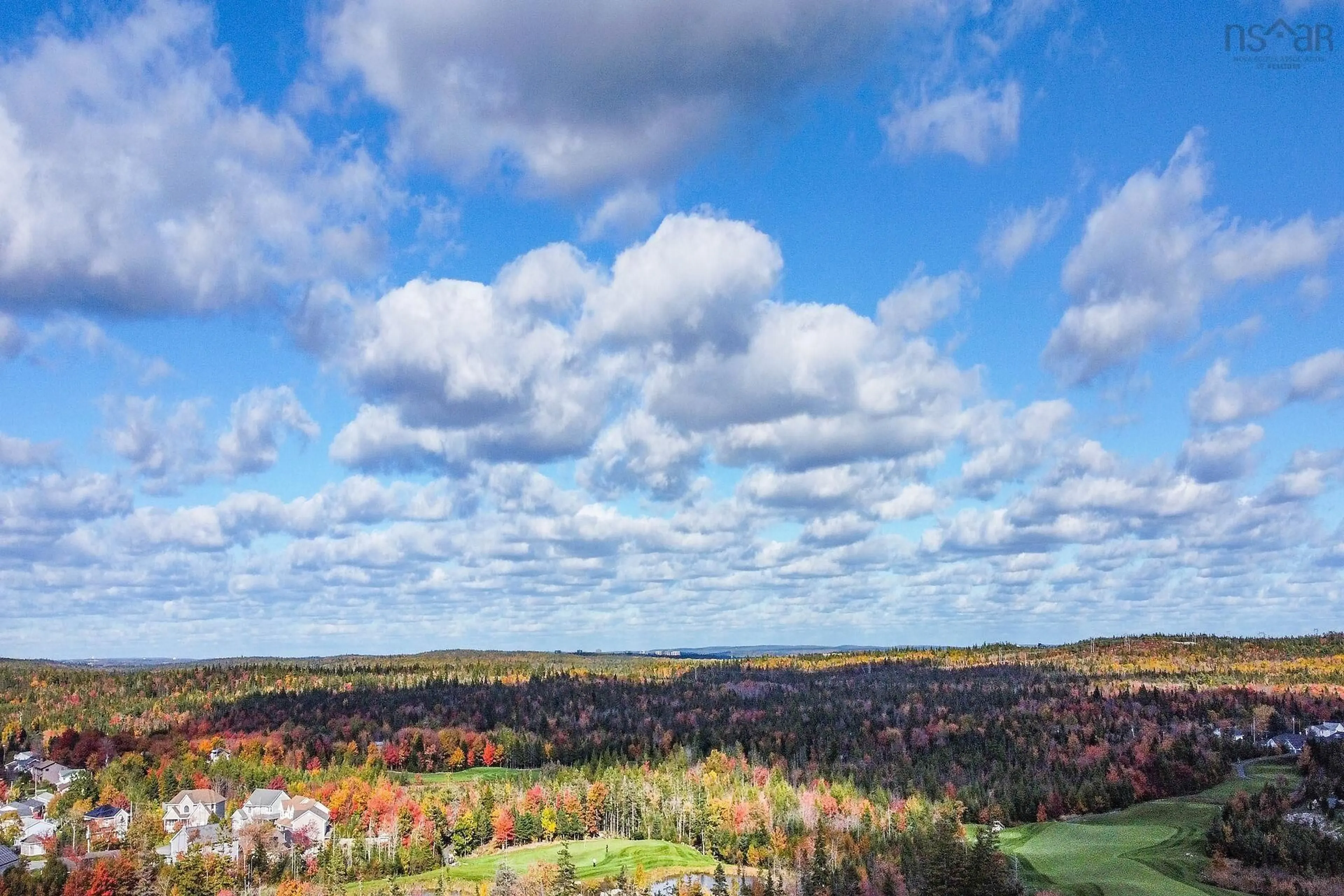 A pic from outside/outdoor area/front of a property/back of a property/a pic from drone, forest/trees view for 7-17 Marketway Lane, Timberlea Nova Scotia B3T 0L1