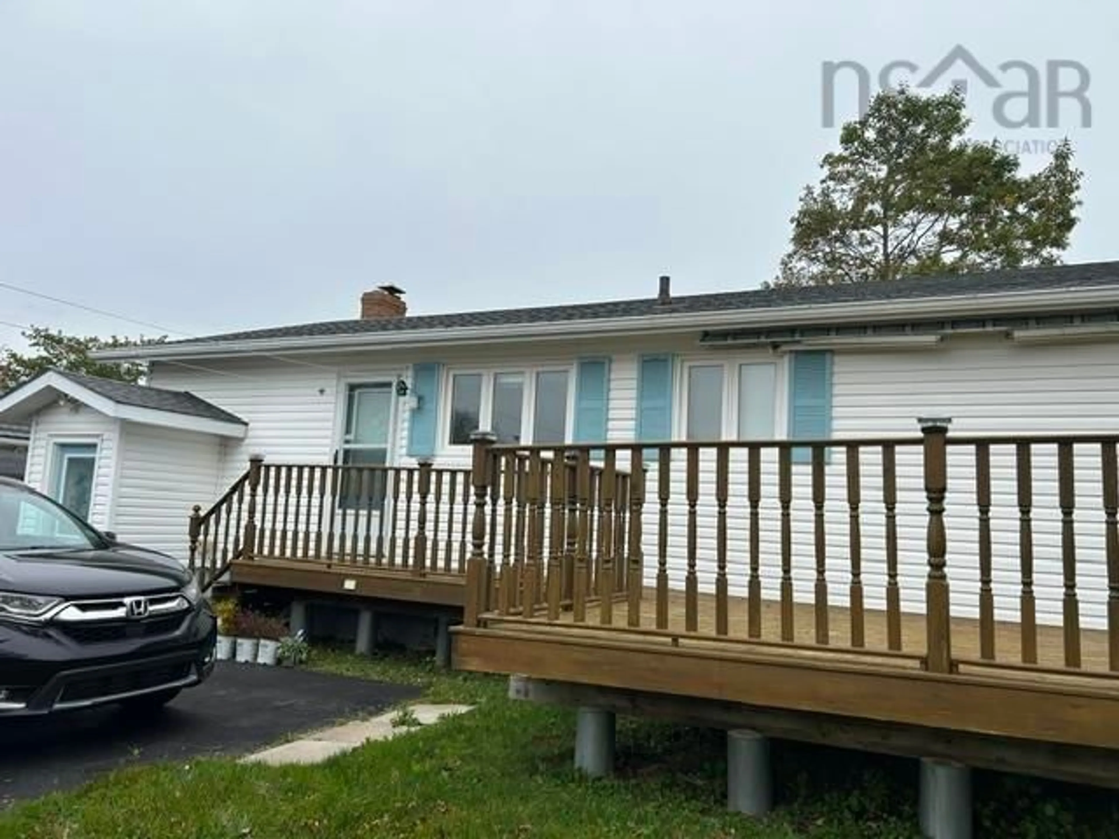 Home with vinyl exterior material, street for 203 Hiram St, Port Hawkesbury Nova Scotia B9A 2C3