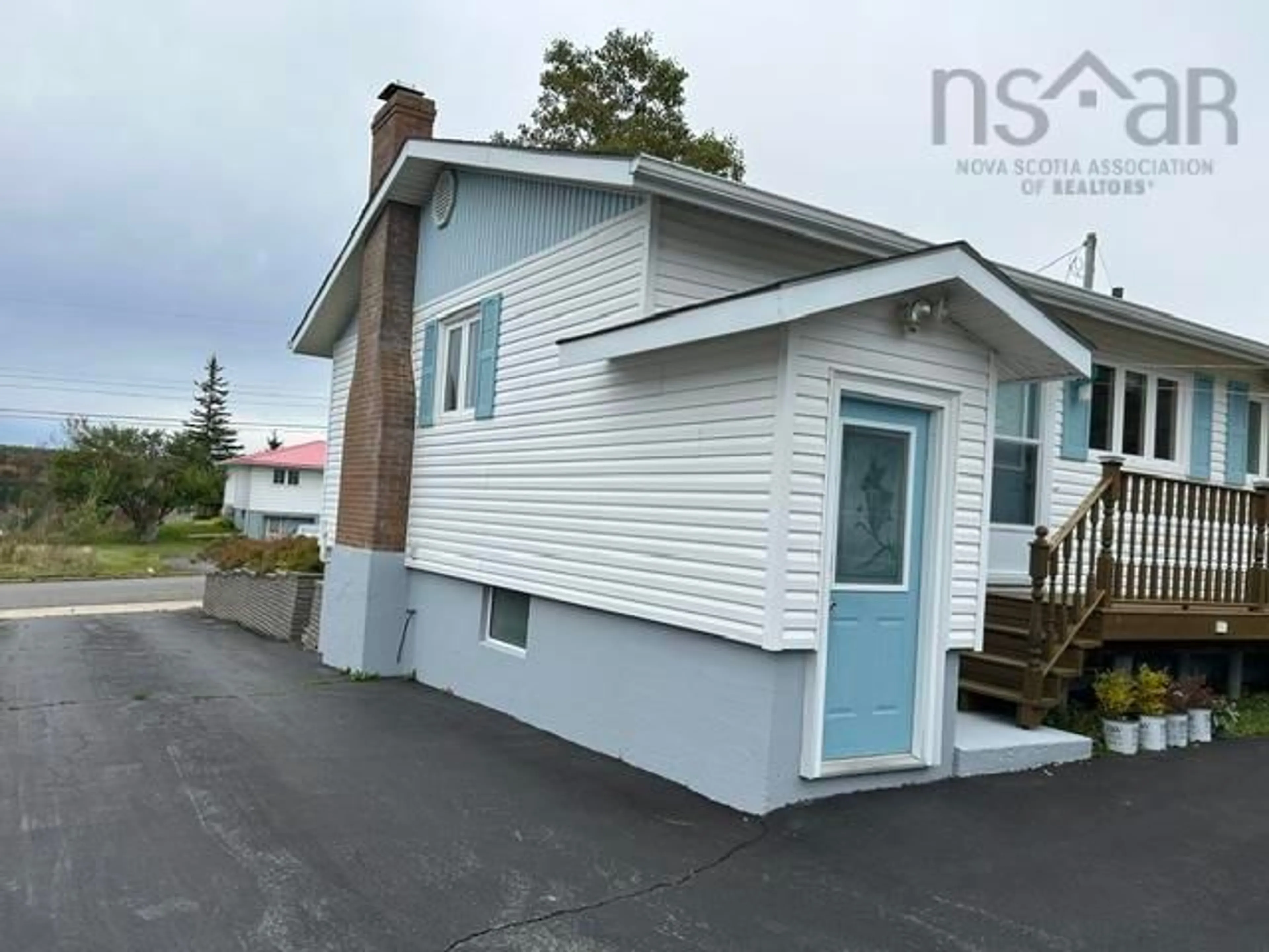 Home with vinyl exterior material, street for 203 Hiram St, Port Hawkesbury Nova Scotia B9A 2C3