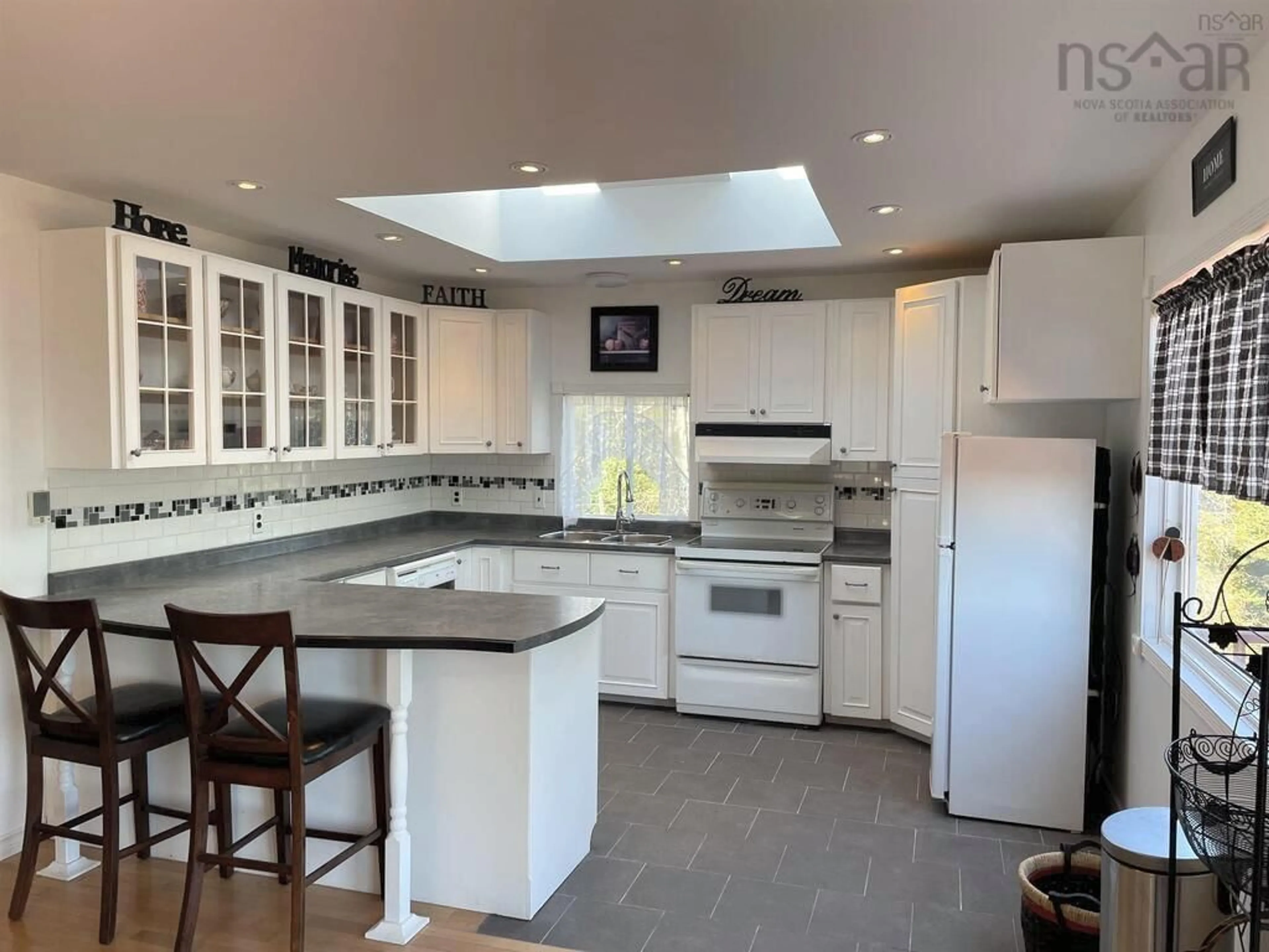 Open concept kitchen, ceramic/tile floor for 114 Hammond Road, Jordan Bay Nova Scotia B0T 1W0
