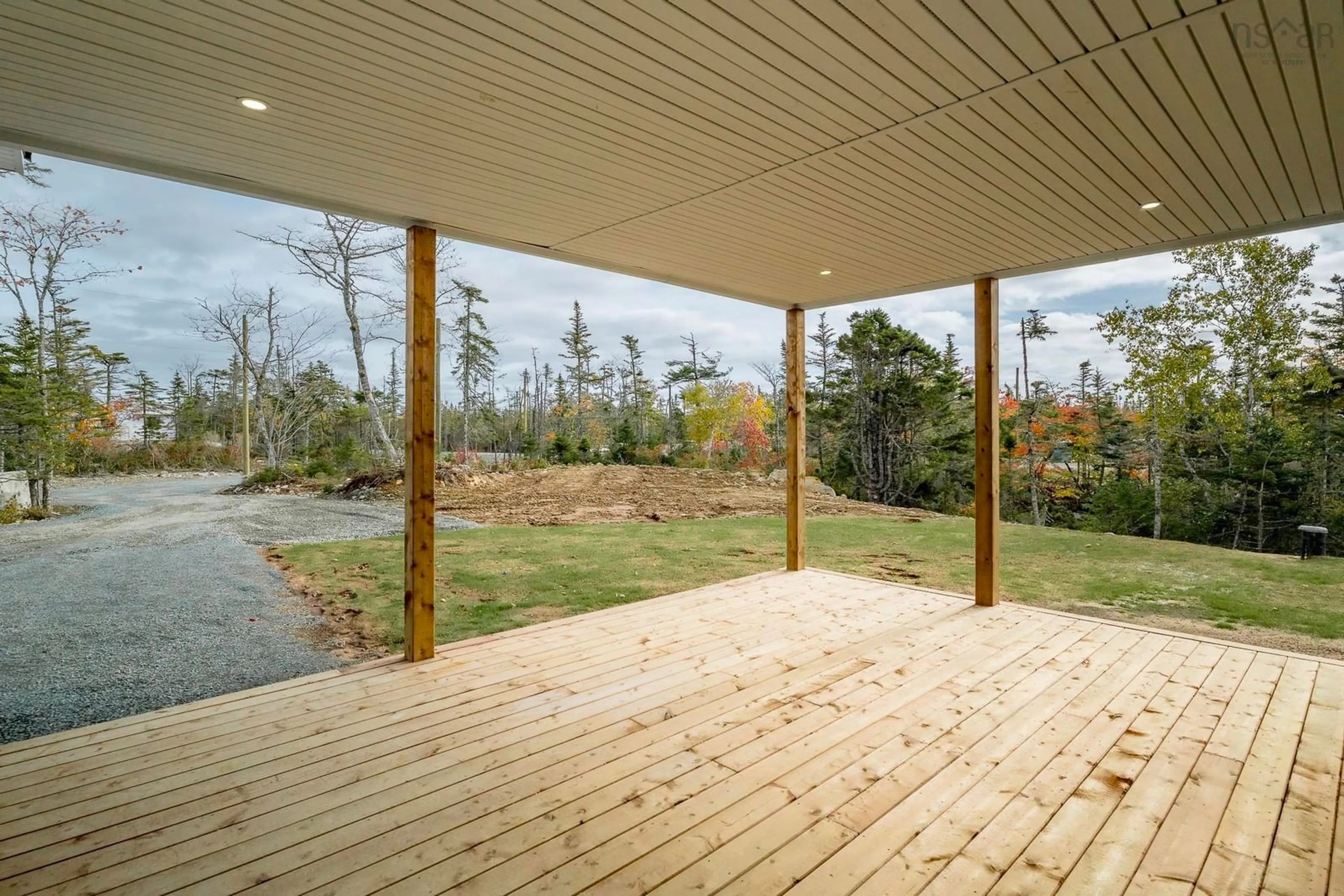 Patio, forest/trees view for 100 Lakepoint Way, West Jeddore Nova Scotia B0J 1P0