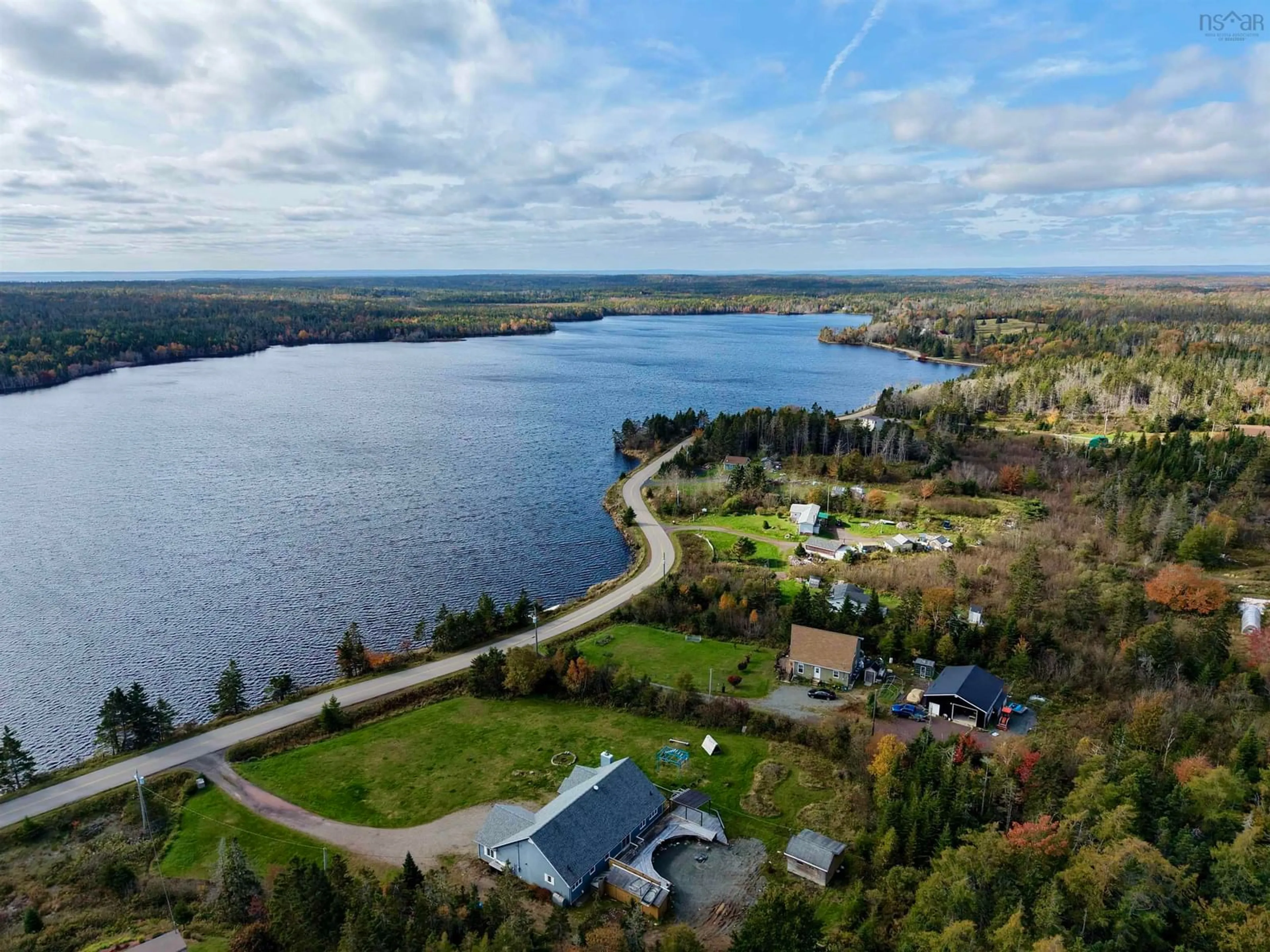 A pic from outside/outdoor area/front of a property/back of a property/a pic from drone, water/lake/river/ocean view for 333 Lochside Rd., Arichat Nova Scotia B0E 1A0