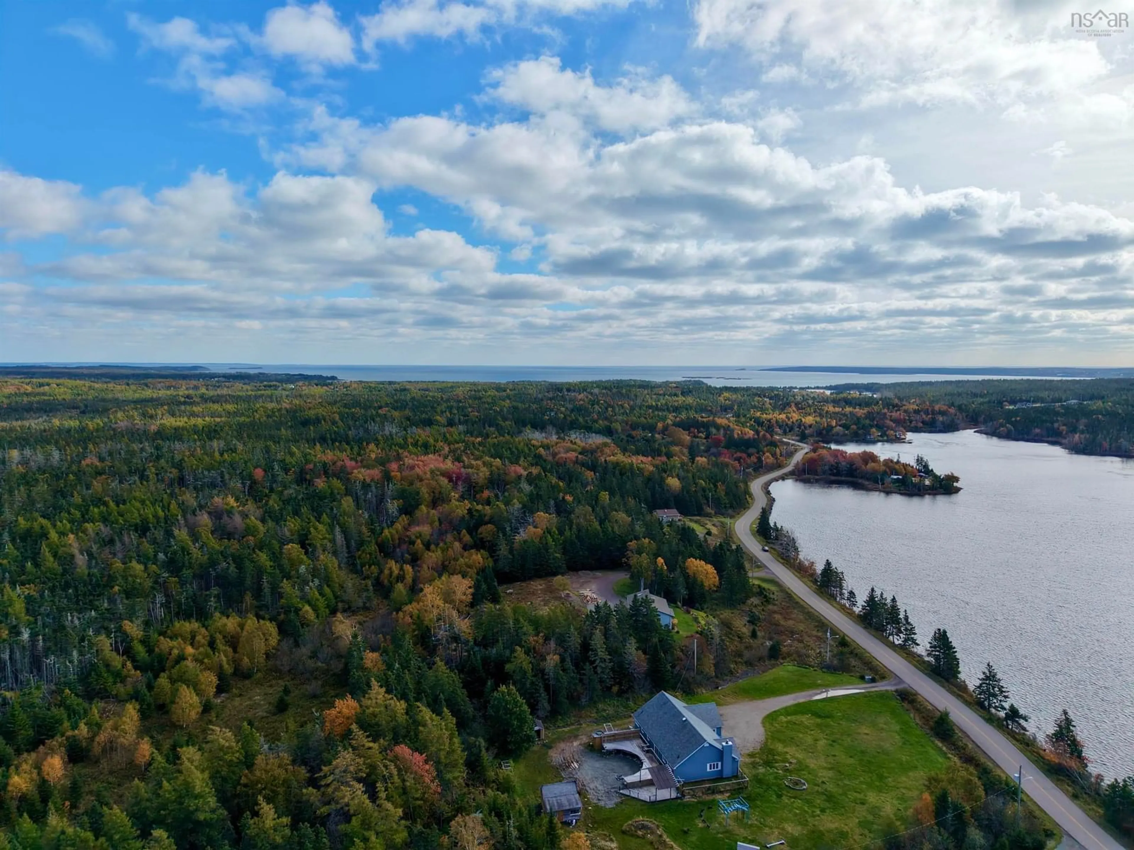 A pic from outside/outdoor area/front of a property/back of a property/a pic from drone, water/lake/river/ocean view for 333 Lochside Rd., Arichat Nova Scotia B0E 1A0