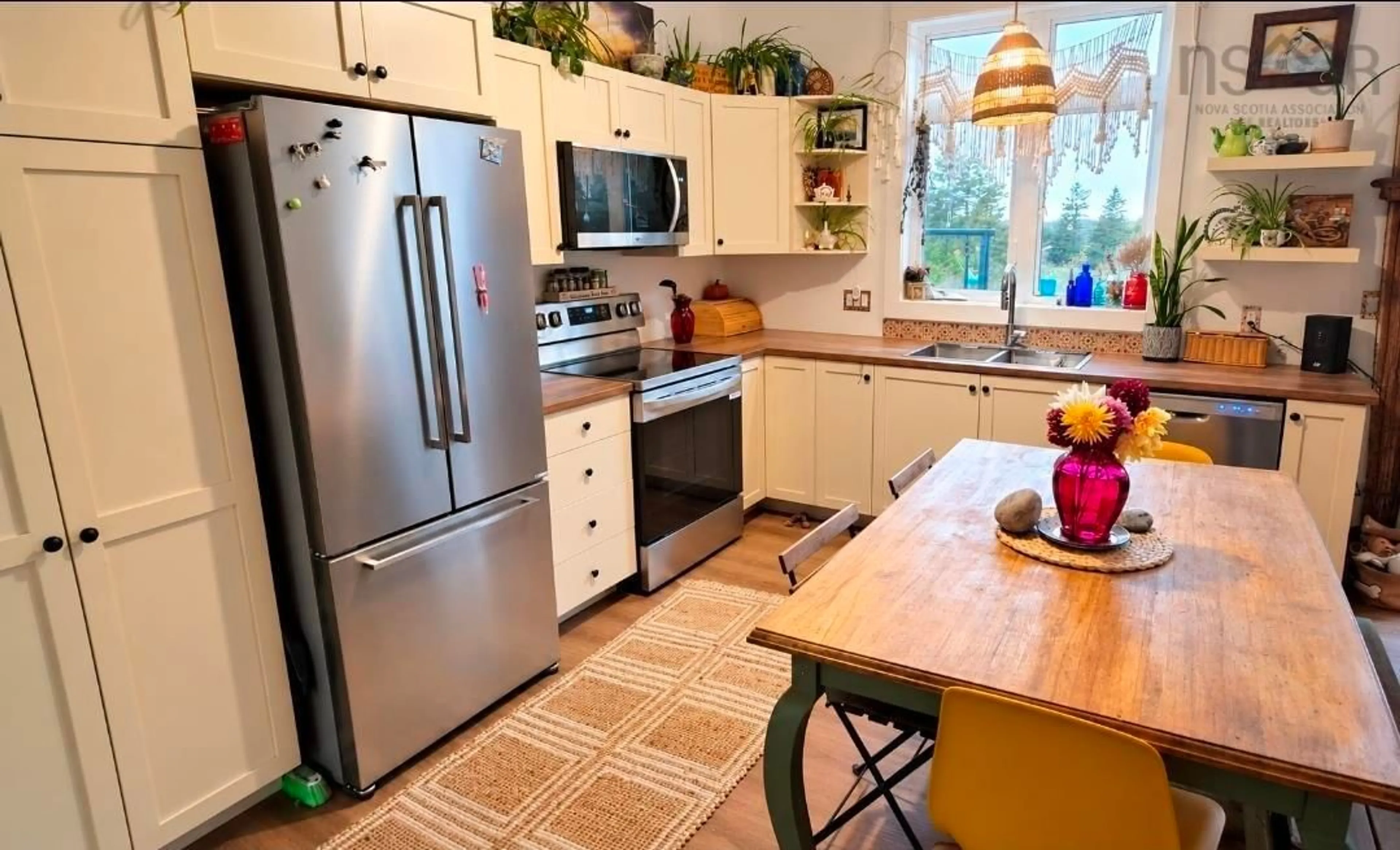 Open concept kitchen, ceramic/tile floor for 938 East Chezzetcook Rd, East Chezzetcook Nova Scotia B0J 2L0