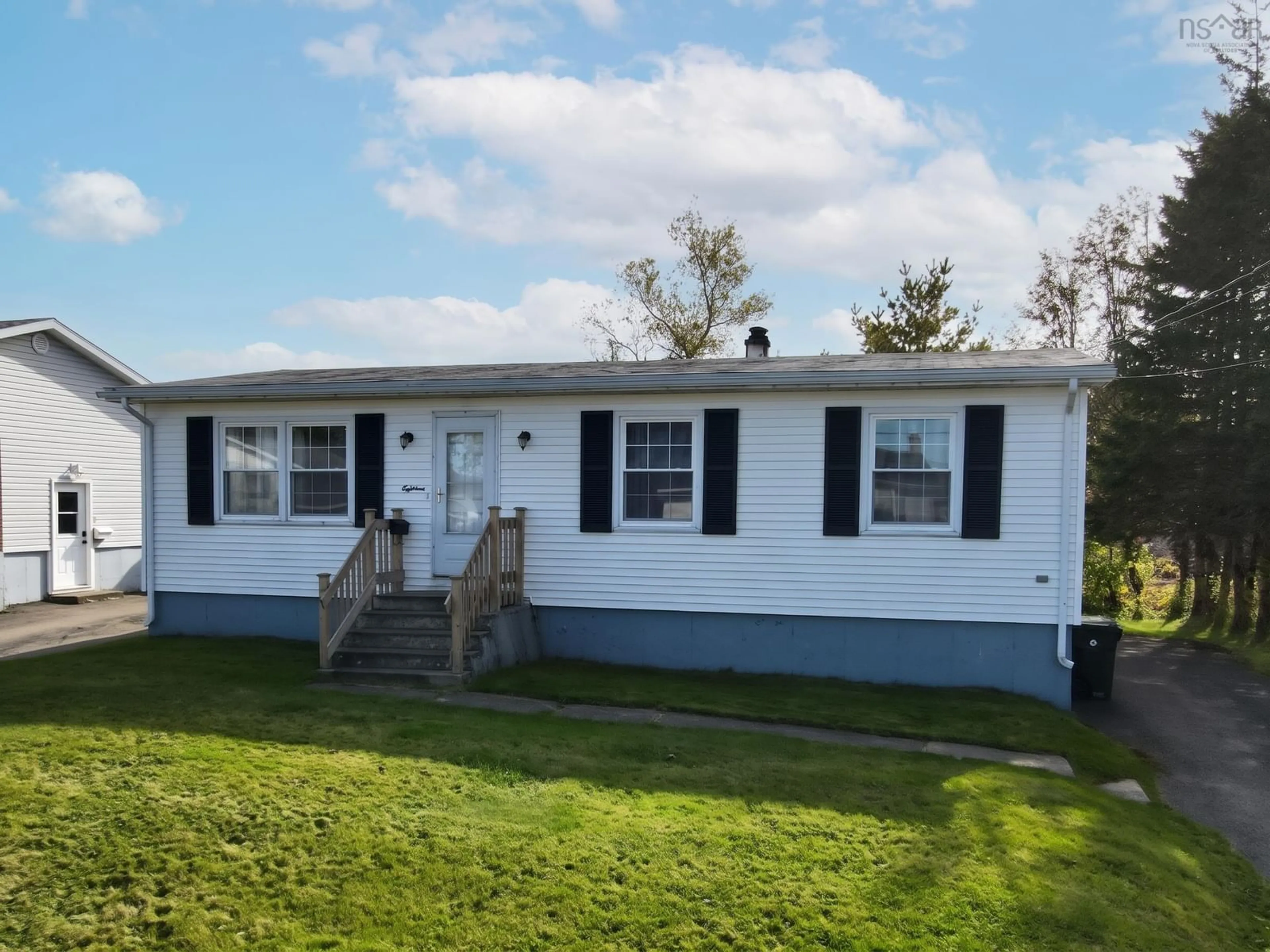 Home with vinyl exterior material, street for 18 Laben Dr, Sydney Nova Scotia B1S 3A5