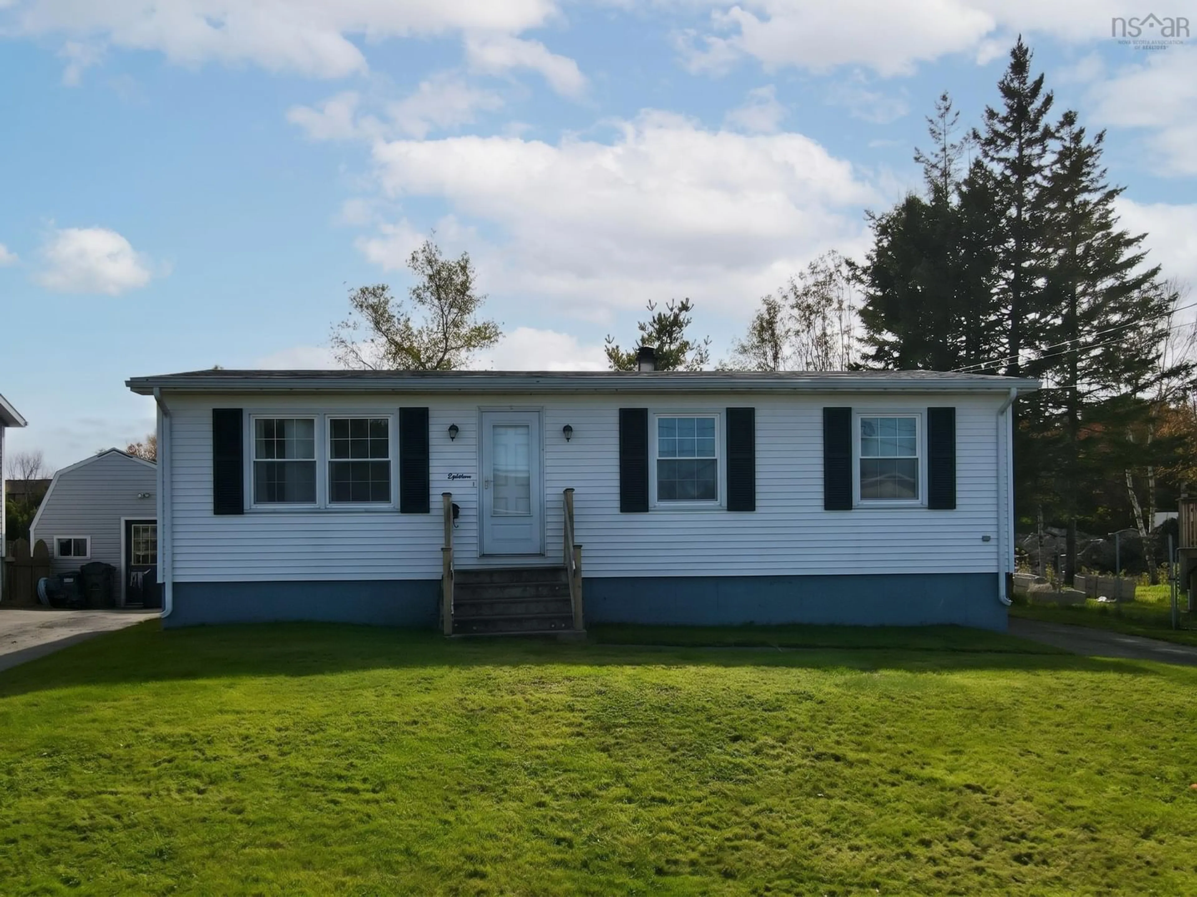 Home with vinyl exterior material, street for 18 Laben Dr, Sydney Nova Scotia B1S 3A5