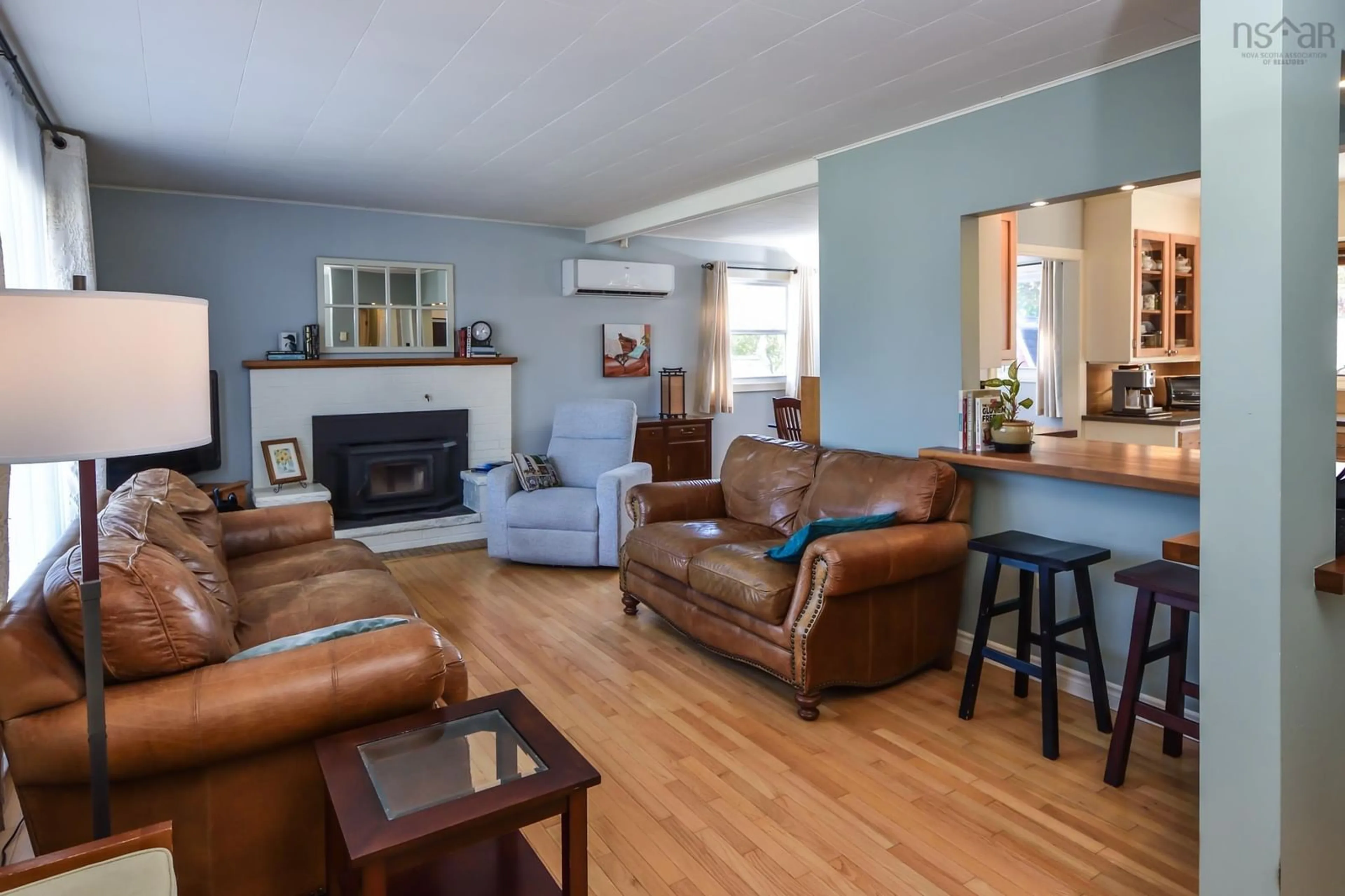 Living room with furniture, wood/laminate floor for 73 Forest Hill Rd, Bridgewater Nova Scotia B4V 1V2