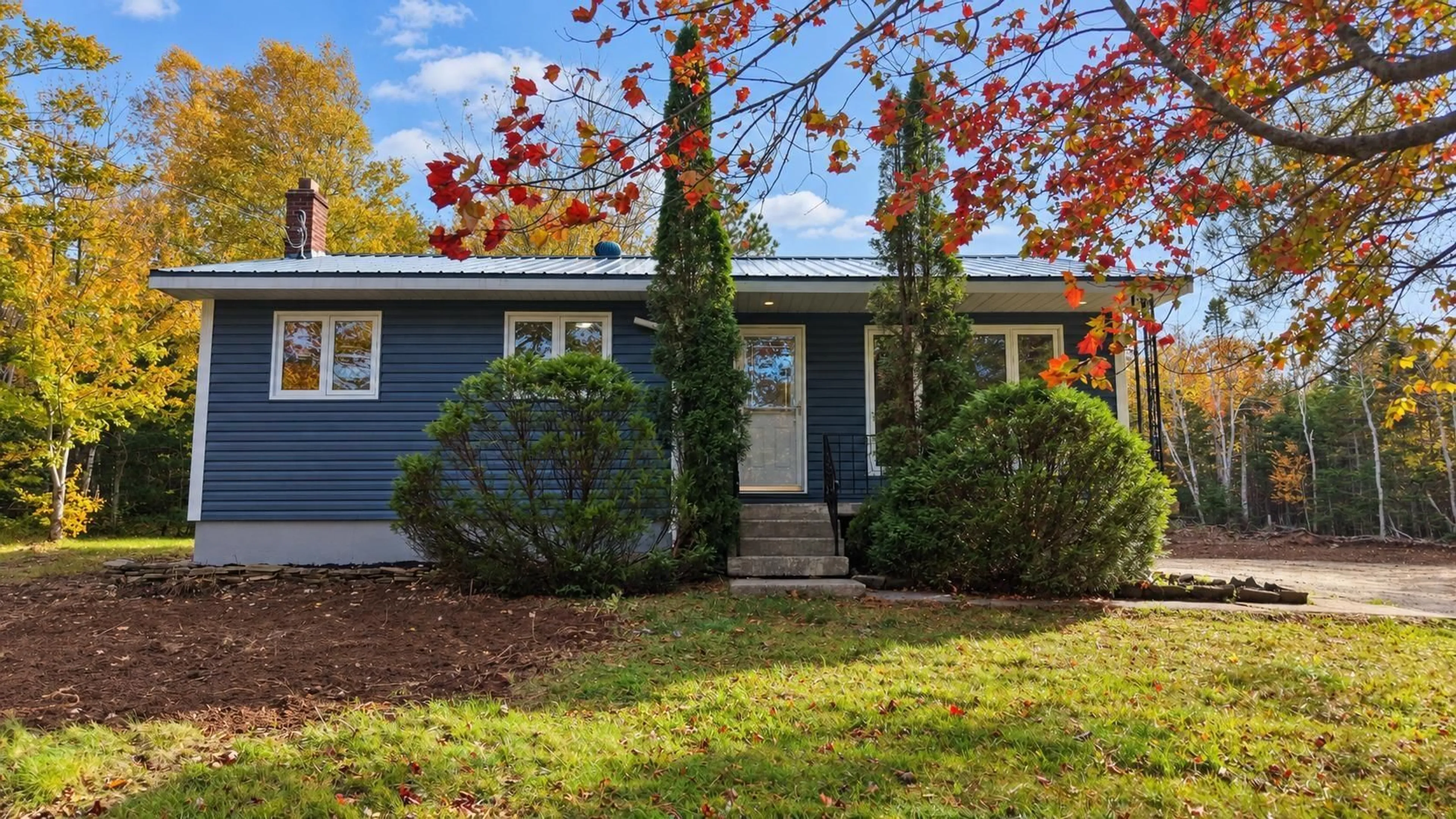 Home with vinyl exterior material, street for 1175 Old Route 5, Big Bras D'Or Nova Scotia B1X 1Y6