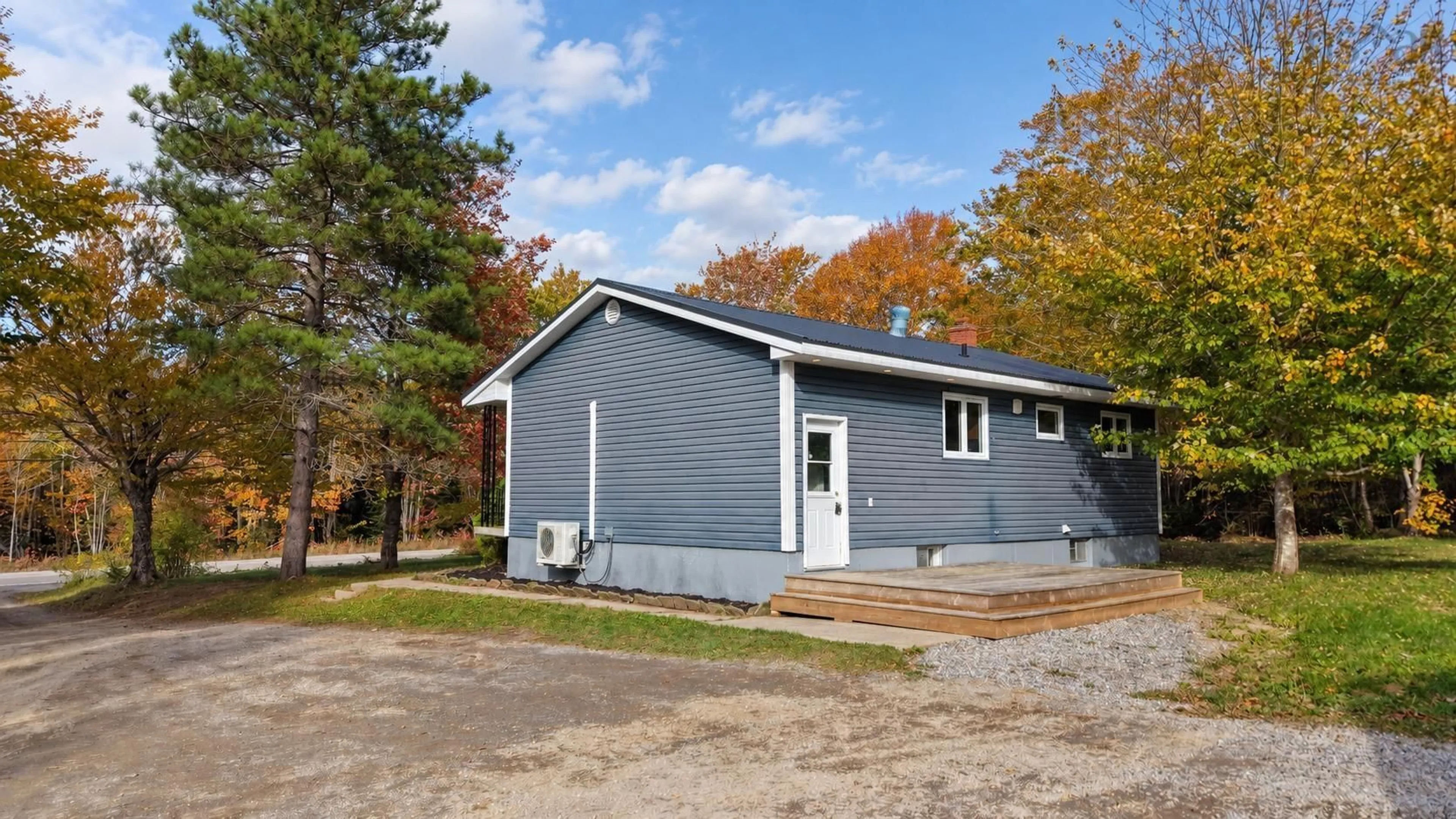 Home with vinyl exterior material, street for 1175 Old Route 5, Big Bras D'Or Nova Scotia B1X 1Y6