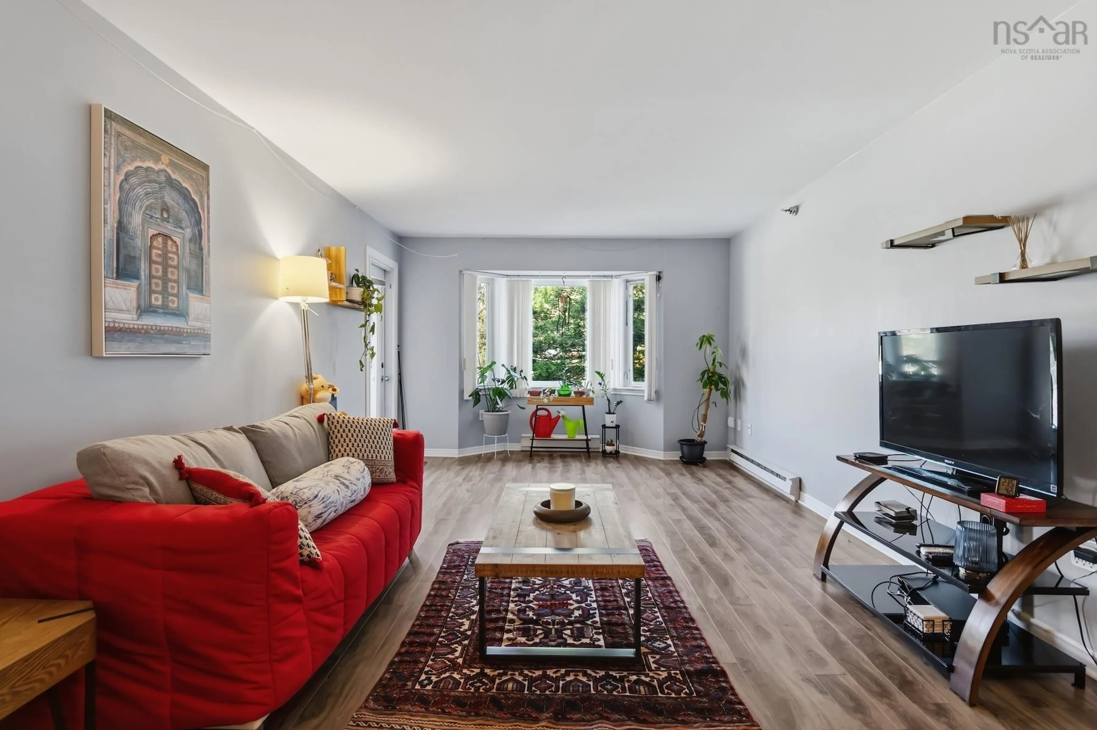 Living room with furniture, unknown for 83 Kearney Lake Rd #202, Halifax Nova Scotia B3M 4E6