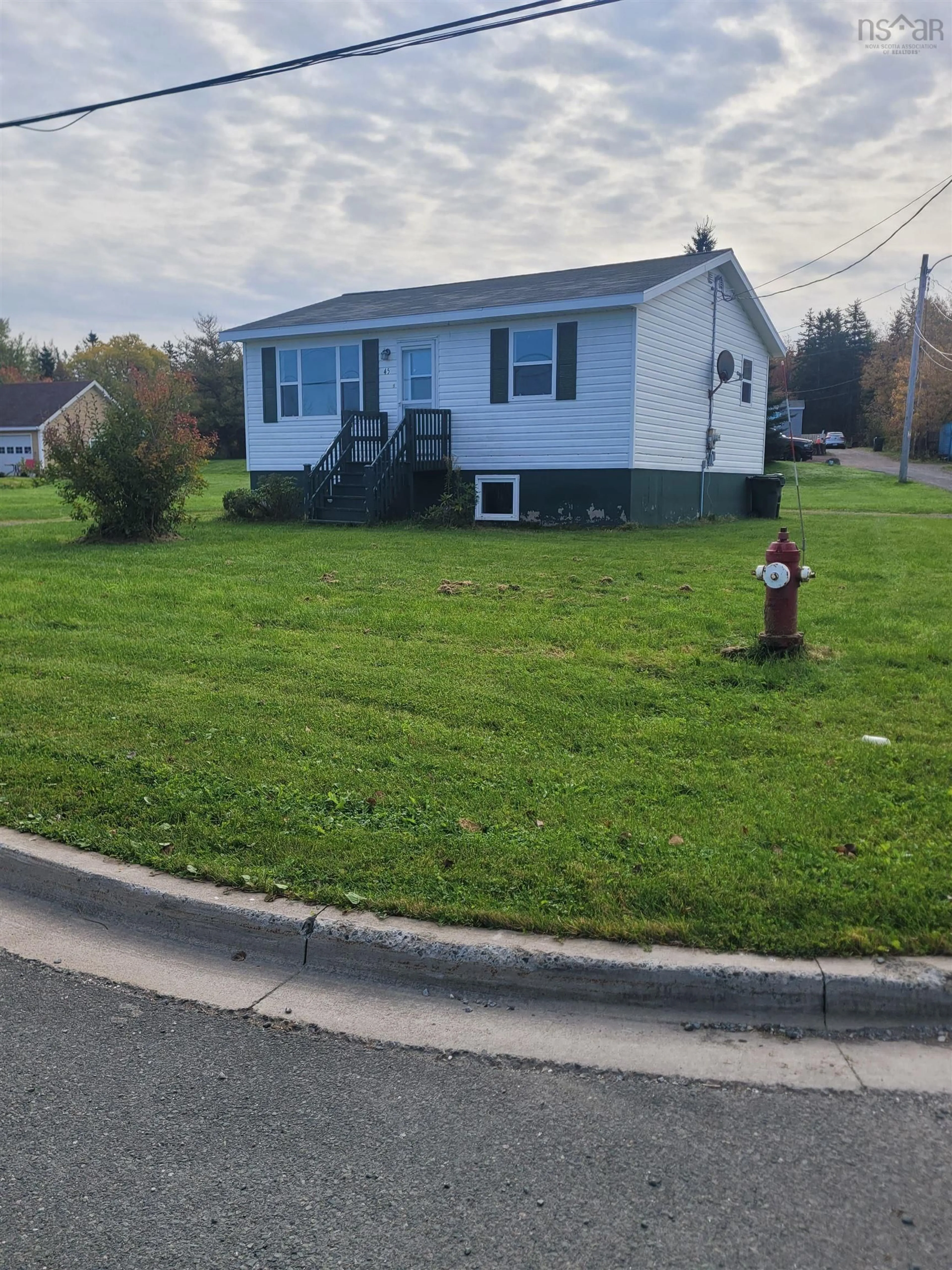 Home with vinyl exterior material, street for 45 Railroad St, Dominion Nova Scotia B1G 1T2
