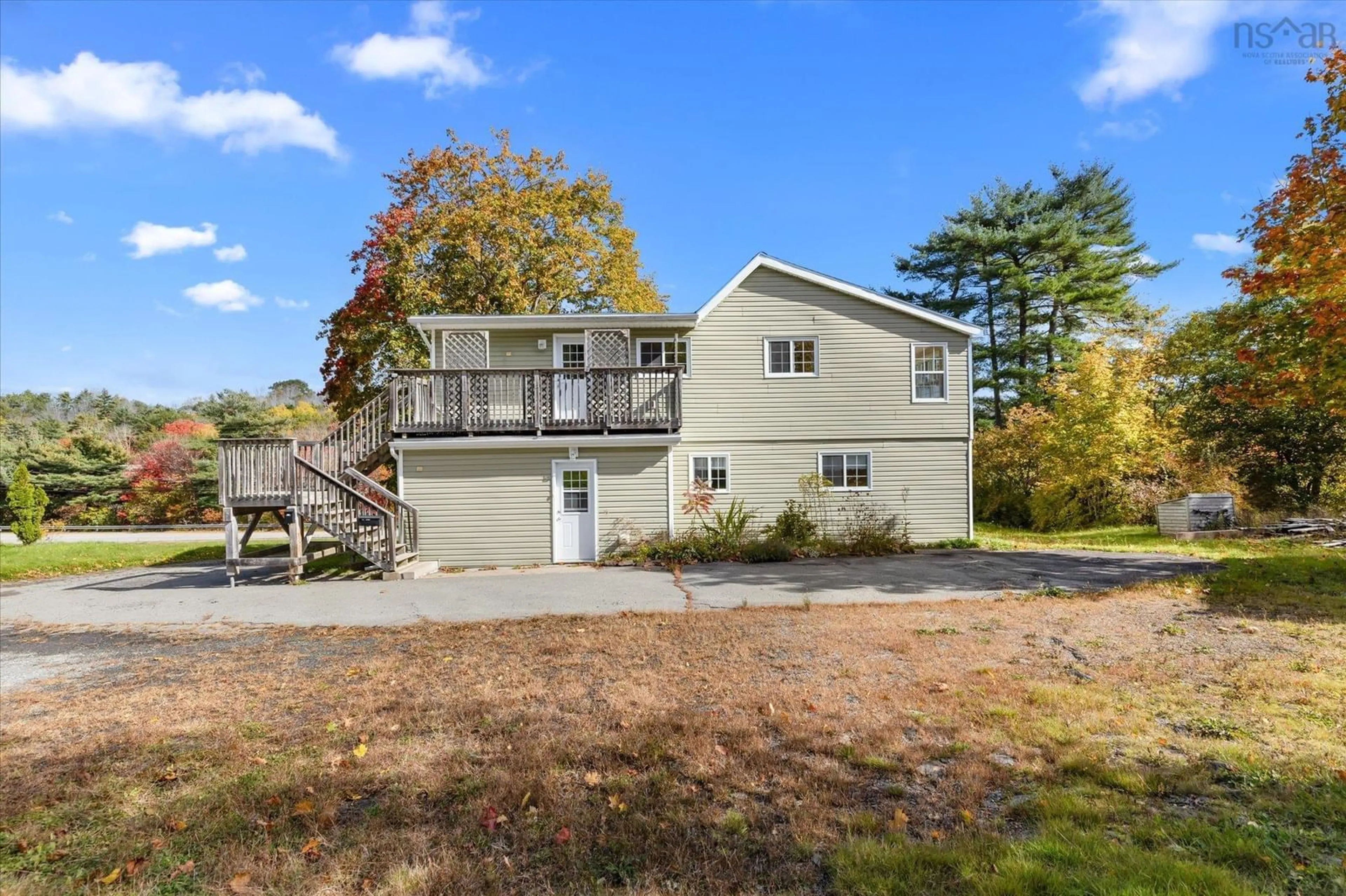 A pic from outside/outdoor area/front of a property/back of a property/a pic from drone, water/lake/river/ocean view for 1163 King St, Bridgewater Nova Scotia B4V 1C3