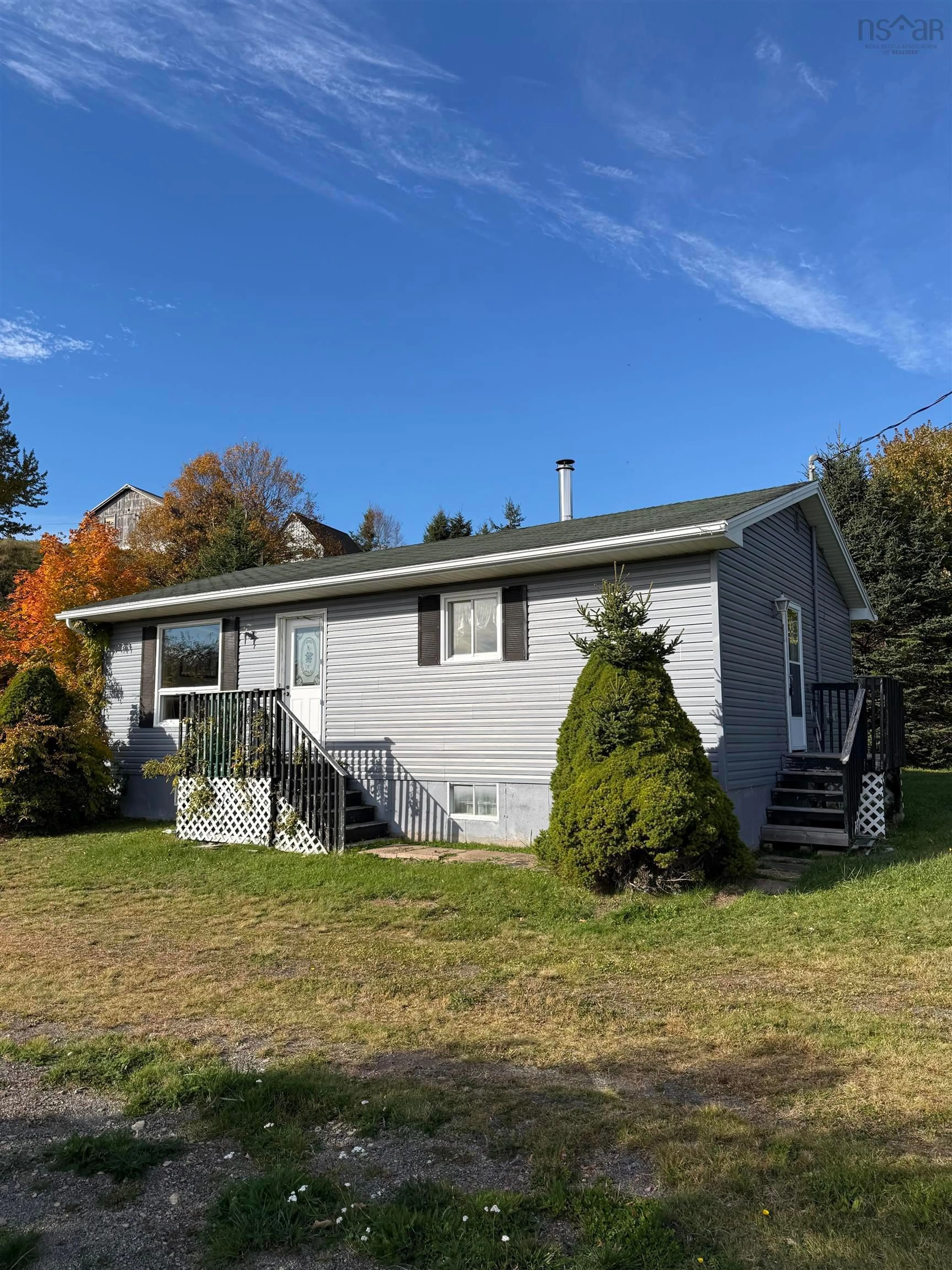 Home with vinyl exterior material, street for 8013 Highway 209, Wards Brook Nova Scotia B0M 1S0