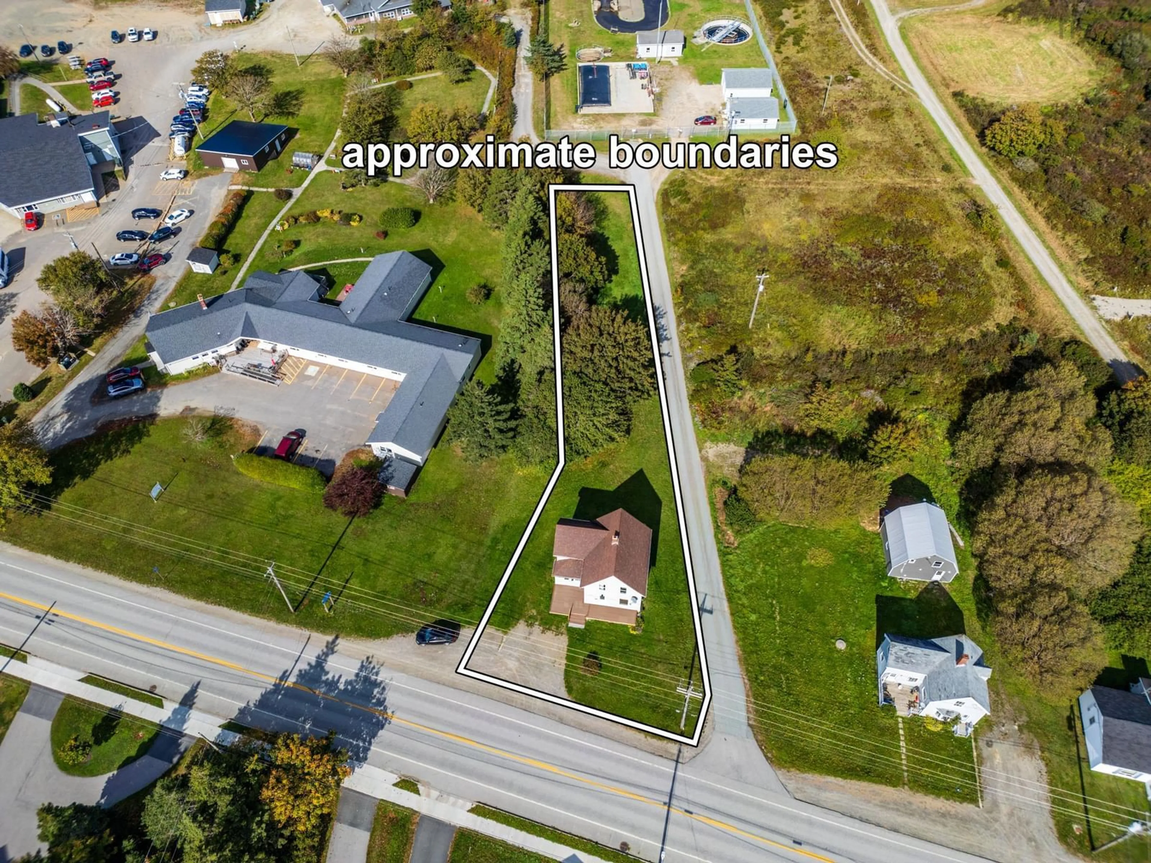 A pic from outside/outdoor area/front of a property/back of a property/a pic from drone, street for 8419 Highway 1, Meteghan Centre Nova Scotia B0W 2K0