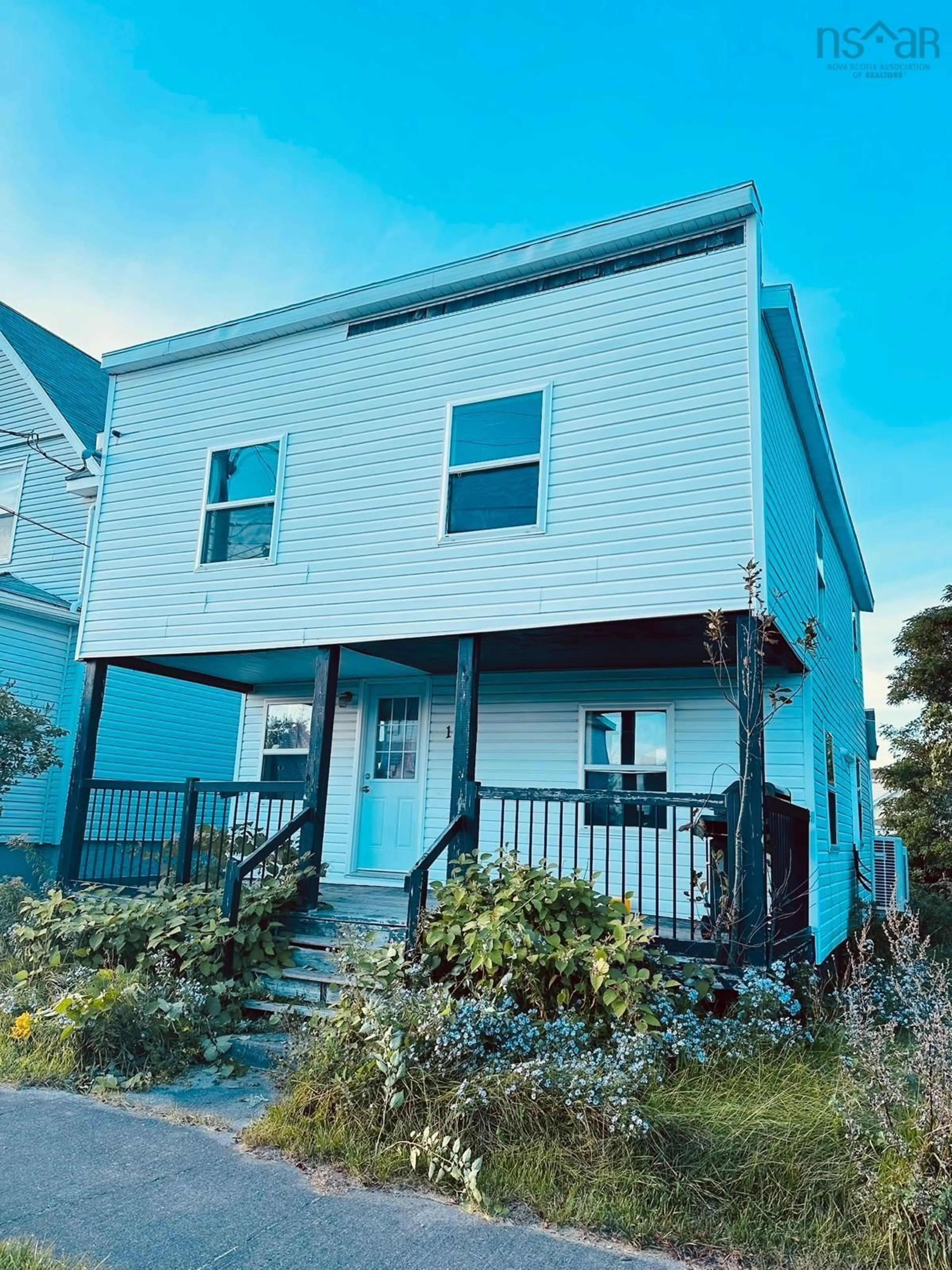 Home with vinyl exterior material, street for 103 Bay St, Sydney Nova Scotia B1N 2J6