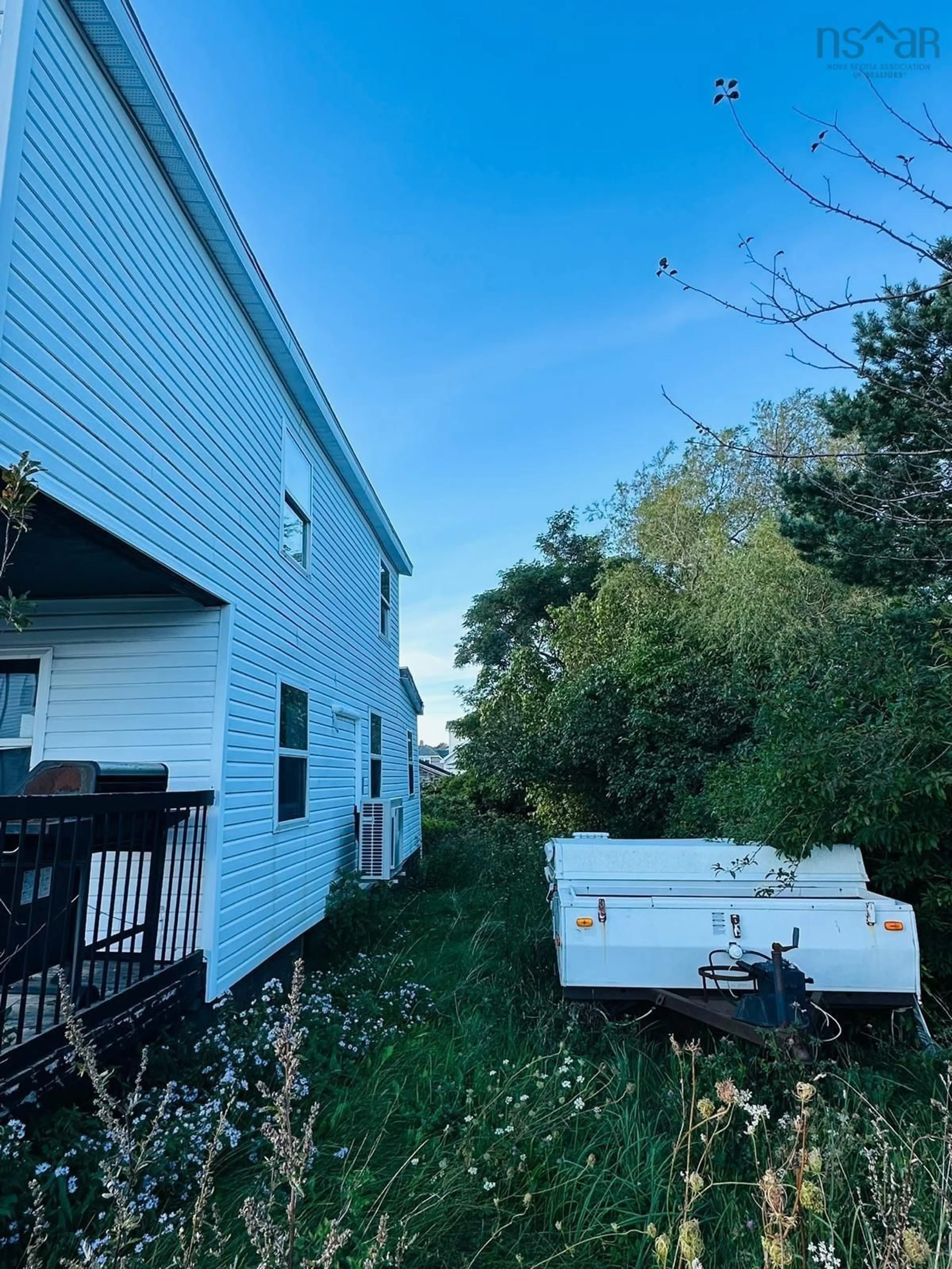 A pic from outside/outdoor area/front of a property/back of a property/a pic from drone, unknown for 103 Bay St, Sydney Nova Scotia B1N 2J6