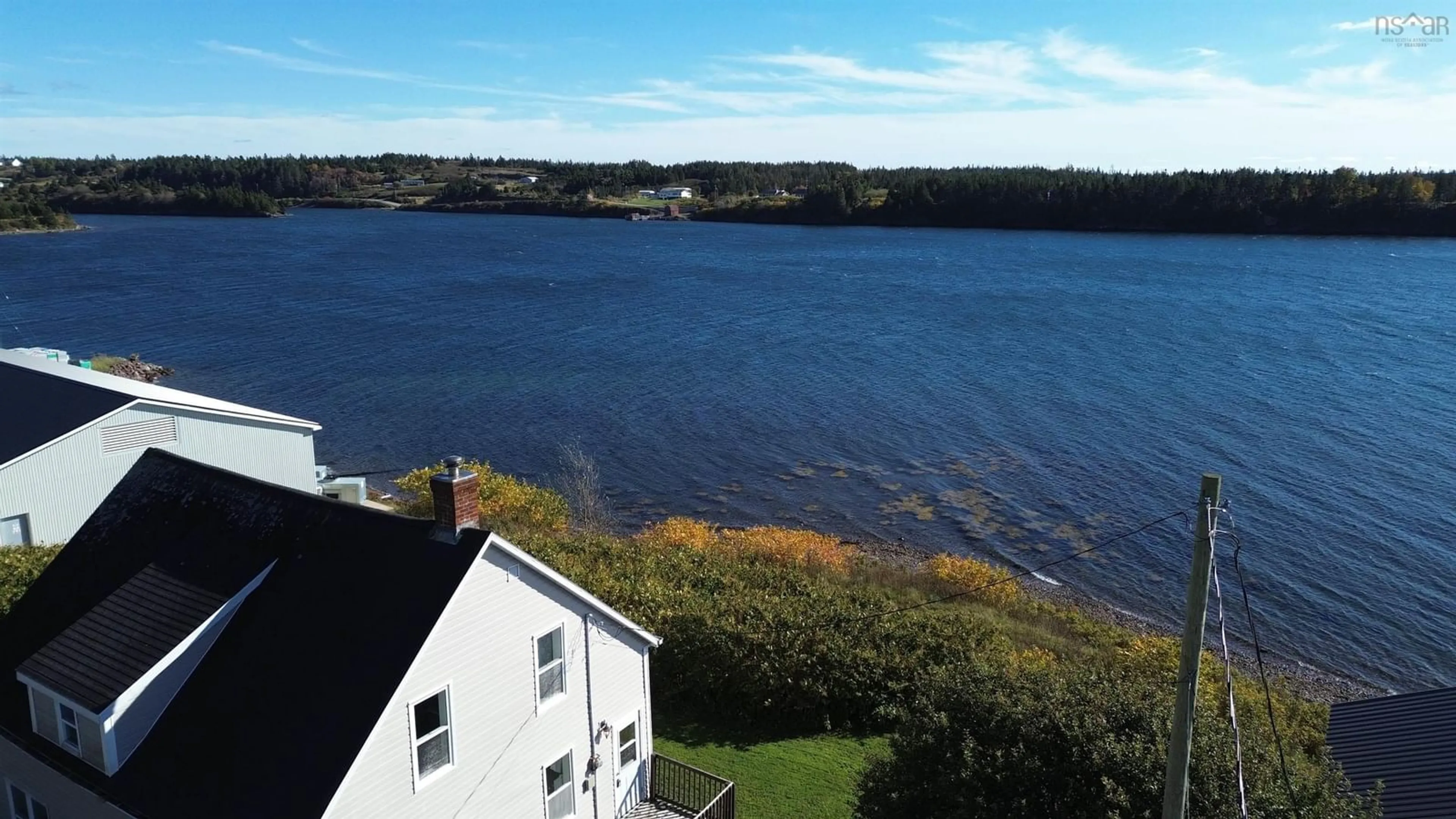 A pic from outside/outdoor area/front of a property/back of a property/a pic from drone, water/lake/river/ocean view for 788 Veterans Memorial Drive, Arichat Nova Scotia B0E 1A0